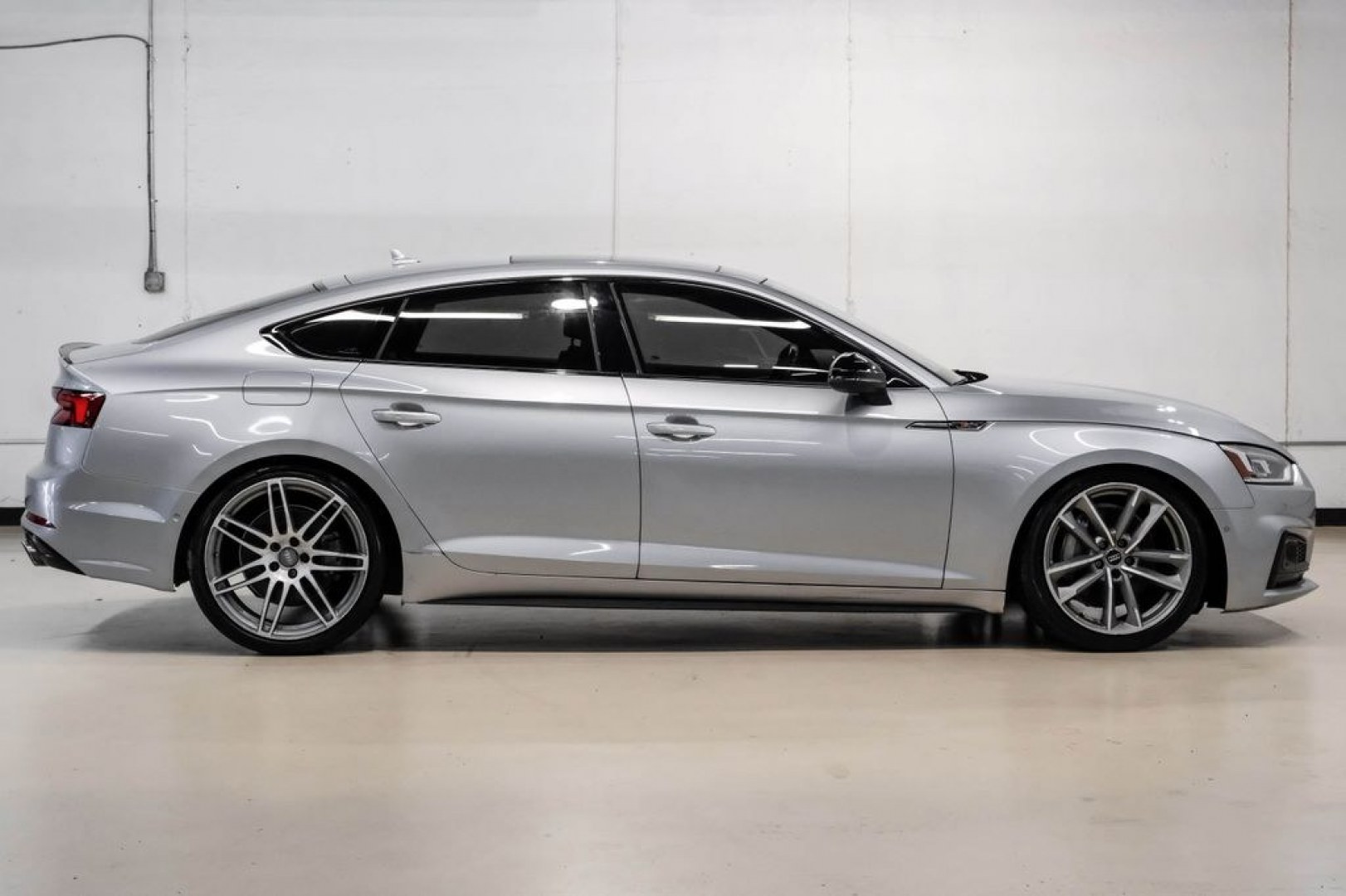 2019 Silver Metallic /Black Audi A5 Sportback Prestige (WAUFNCF55KA) with an 2.0L 4-Cylinder TFSI engine, Automatic transmission, located at 15300 Midway Rd., Addison, TX, 75001, (972) 702-0011, 32.958321, -96.838074- Photo#7