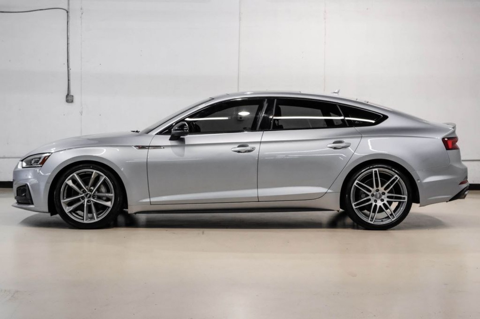 2019 Silver Metallic /Black Audi A5 Sportback Prestige (WAUFNCF55KA) with an 2.0L 4-Cylinder TFSI engine, Automatic transmission, located at 15300 Midway Rd., Addison, TX, 75001, (972) 702-0011, 32.958321, -96.838074- Photo#10
