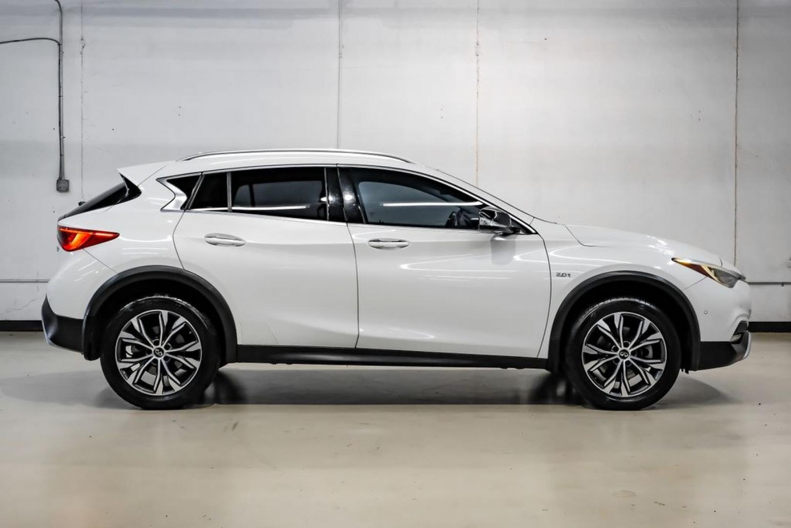 2017 Majestic /Graphite INFINITI QX30 Premium (SJKCH5CR3HA) with an 2.0L I4 Turbocharged engine, Automatic transmission, located at 15300 Midway Rd., Addison, TX, 75001, (972) 702-0011, 32.958321, -96.838074- Photo#6