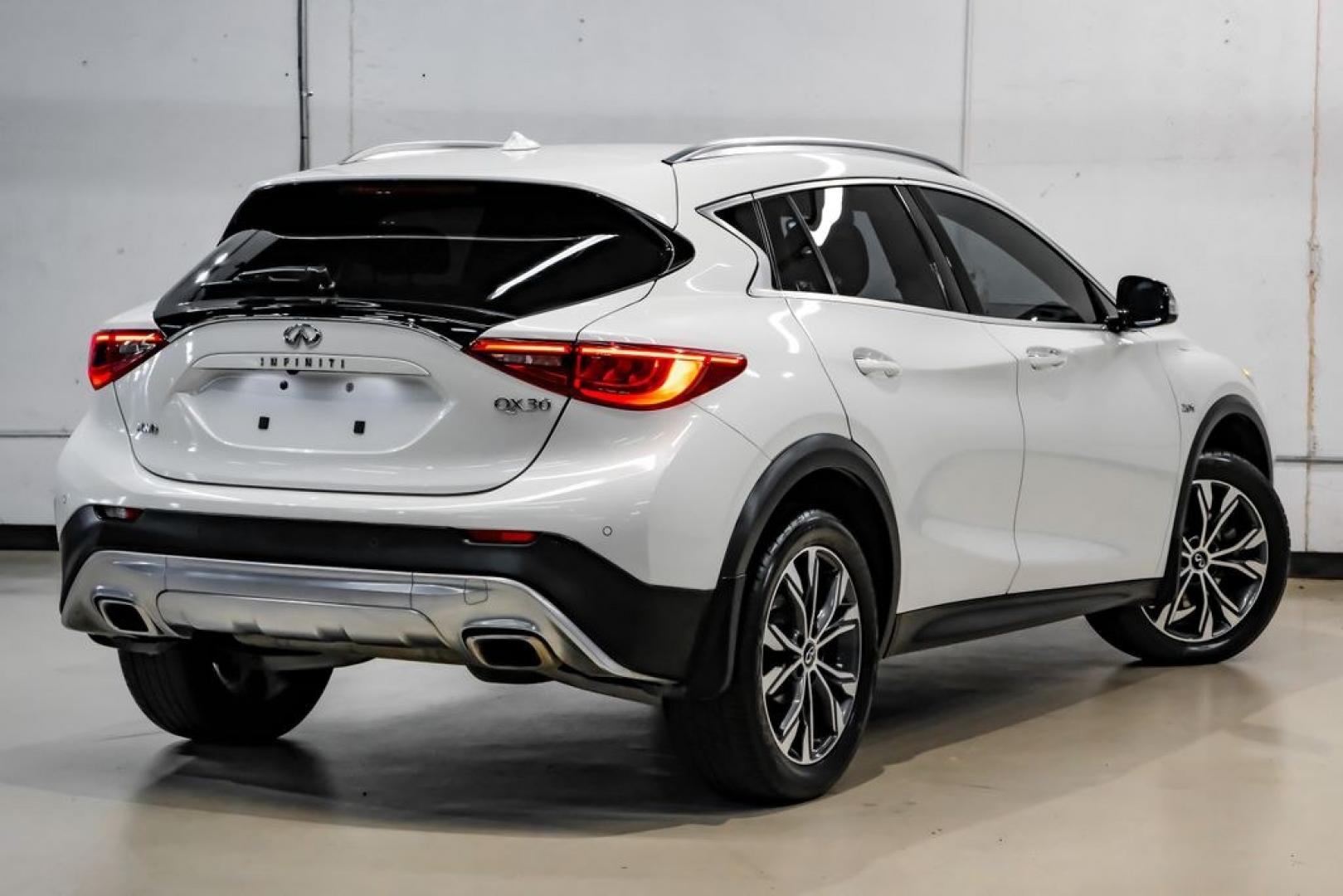 2017 Majestic /Graphite INFINITI QX30 Premium (SJKCH5CR3HA) with an 2.0L I4 Turbocharged engine, Automatic transmission, located at 15300 Midway Rd., Addison, TX, 75001, (972) 702-0011, 32.958321, -96.838074- Photo#7