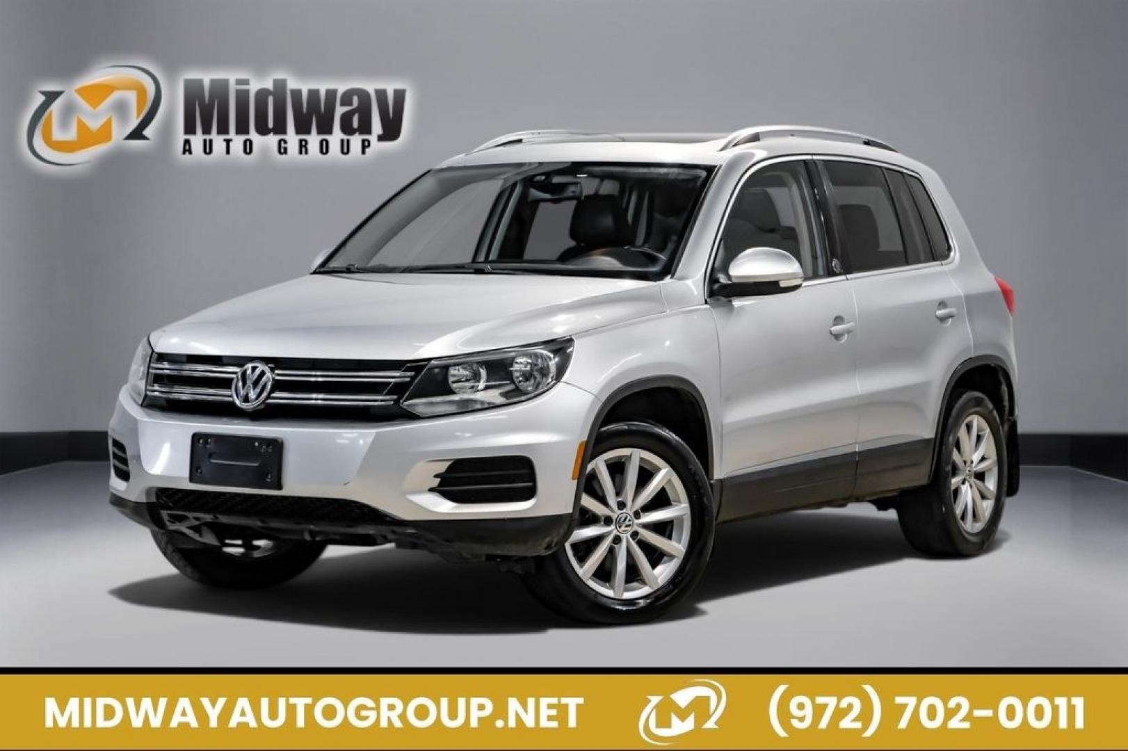2017 Reflex Silver Metallic /Charcoal Black Volkswagen Tiguan 2.0T Wolfsburg Edition (WVGSV7AX8HK) with an 2.0L TSI DOHC engine, Automatic transmission, located at 15300 Midway Rd., Addison, TX, 75001, (972) 702-0011, 32.958321, -96.838074- Photo#0