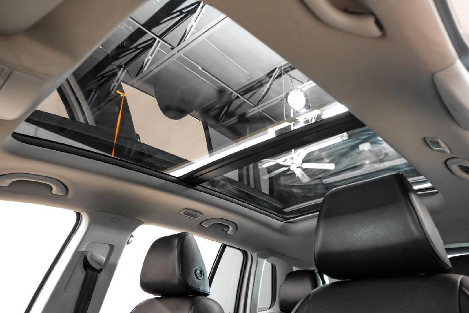 2017 Reflex Silver Metallic /Charcoal Black Volkswagen Tiguan 2.0T Wolfsburg Edition (WVGSV7AX8HK) with an 2.0L TSI DOHC engine, Automatic transmission, located at 15300 Midway Rd., Addison, TX, 75001, (972) 702-0011, 32.958321, -96.838074- Photo#4