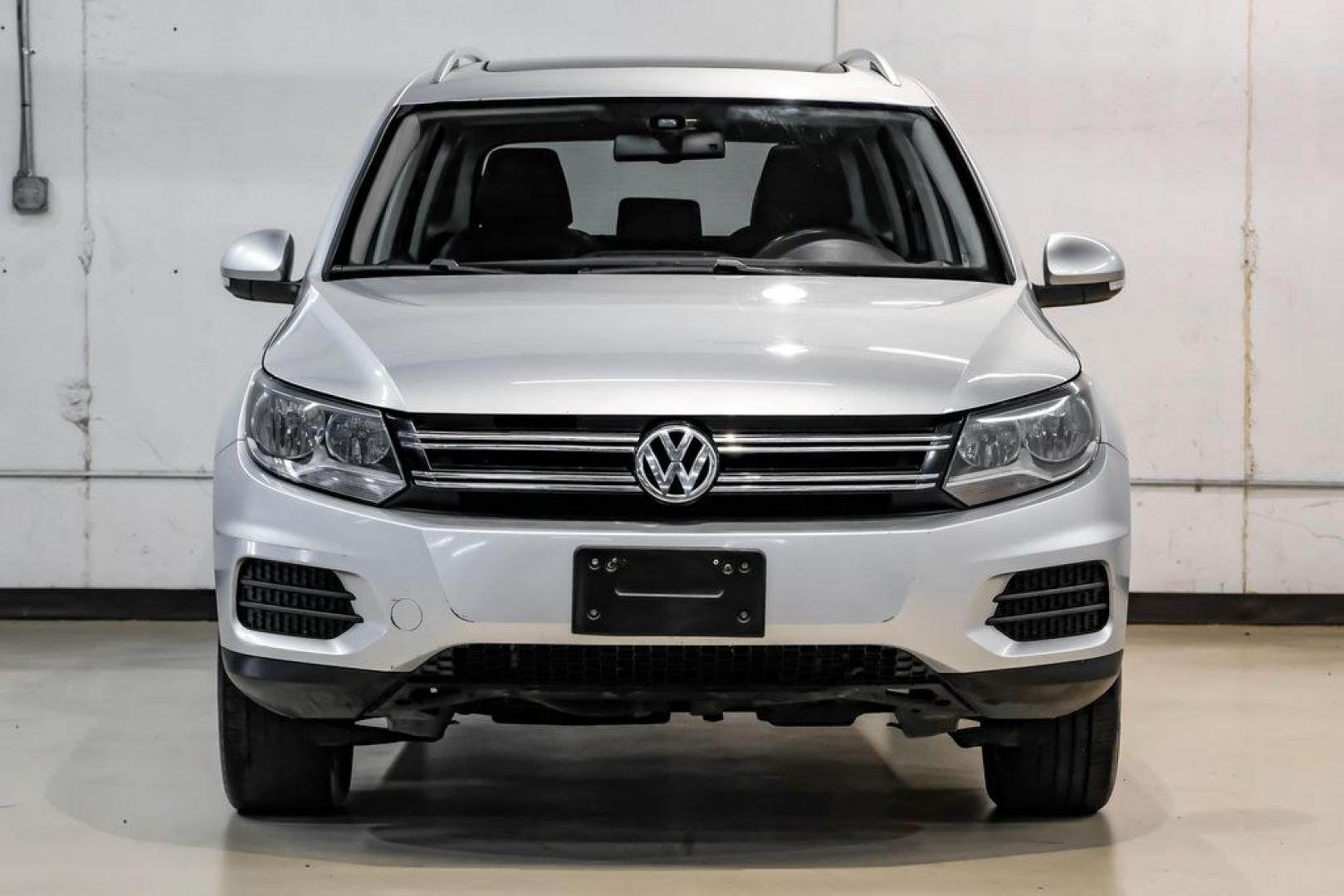 2017 Reflex Silver Metallic /Charcoal Black Volkswagen Tiguan 2.0T Wolfsburg Edition (WVGSV7AX8HK) with an 2.0L TSI DOHC engine, Automatic transmission, located at 15300 Midway Rd., Addison, TX, 75001, (972) 702-0011, 32.958321, -96.838074- Photo#5