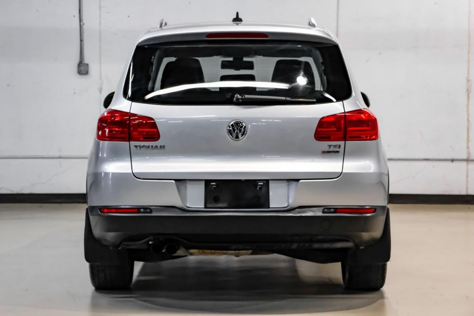 2017 Reflex Silver Metallic /Charcoal Black Volkswagen Tiguan 2.0T Wolfsburg Edition (WVGSV7AX8HK) with an 2.0L TSI DOHC engine, Automatic transmission, located at 15300 Midway Rd., Addison, TX, 75001, (972) 702-0011, 32.958321, -96.838074- Photo#8