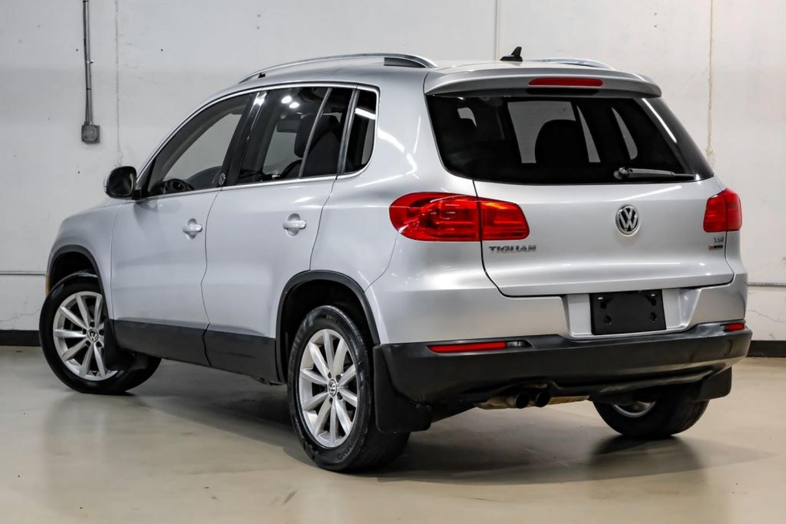 2017 Reflex Silver Metallic /Charcoal Black Volkswagen Tiguan 2.0T Wolfsburg Edition (WVGSV7AX8HK) with an 2.0L TSI DOHC engine, Automatic transmission, located at 15300 Midway Rd., Addison, TX, 75001, (972) 702-0011, 32.958321, -96.838074- Photo#9