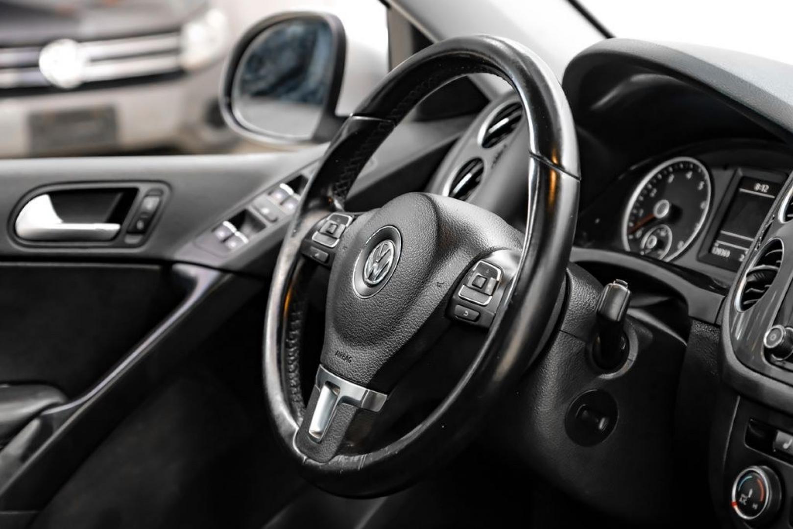 2017 Reflex Silver Metallic /Charcoal Black Volkswagen Tiguan 2.0T Wolfsburg Edition (WVGSV7AX8HK) with an 2.0L TSI DOHC engine, Automatic transmission, located at 15300 Midway Rd., Addison, TX, 75001, (972) 702-0011, 32.958321, -96.838074- Photo#13