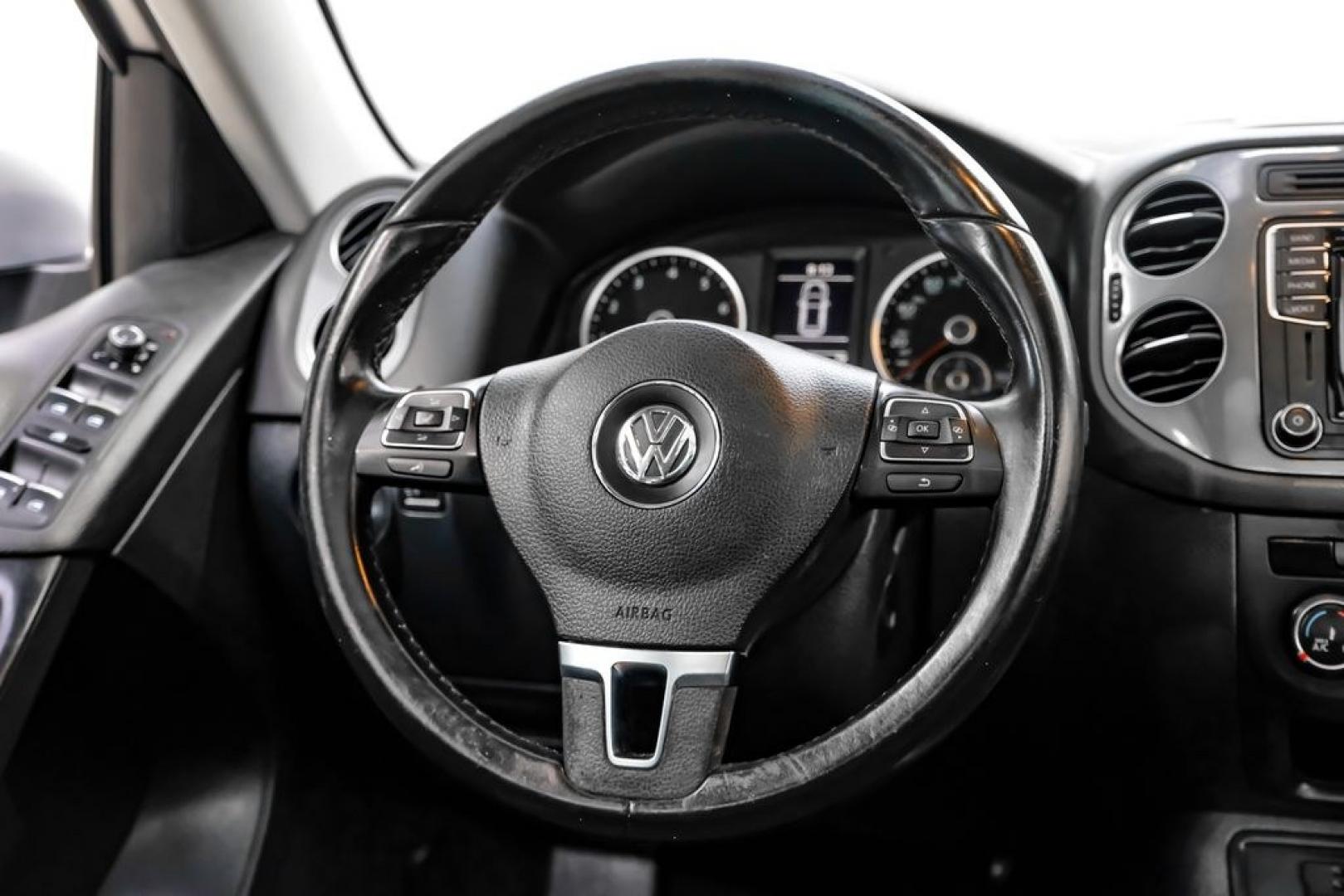 2017 Reflex Silver Metallic /Charcoal Black Volkswagen Tiguan 2.0T Wolfsburg Edition (WVGSV7AX8HK) with an 2.0L TSI DOHC engine, Automatic transmission, located at 15300 Midway Rd., Addison, TX, 75001, (972) 702-0011, 32.958321, -96.838074- Photo#15
