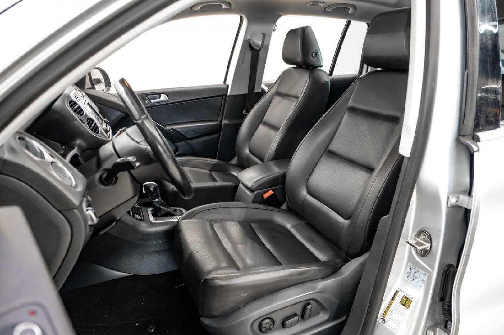 2017 Reflex Silver Metallic /Charcoal Black Volkswagen Tiguan 2.0T Wolfsburg Edition (WVGSV7AX8HK) with an 2.0L TSI DOHC engine, Automatic transmission, located at 15300 Midway Rd., Addison, TX, 75001, (972) 702-0011, 32.958321, -96.838074- Photo#28