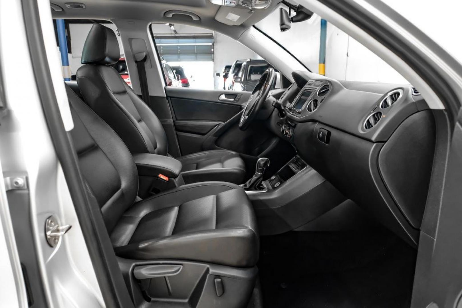 2017 Reflex Silver Metallic /Charcoal Black Volkswagen Tiguan 2.0T Wolfsburg Edition (WVGSV7AX8HK) with an 2.0L TSI DOHC engine, Automatic transmission, located at 15300 Midway Rd., Addison, TX, 75001, (972) 702-0011, 32.958321, -96.838074- Photo#29