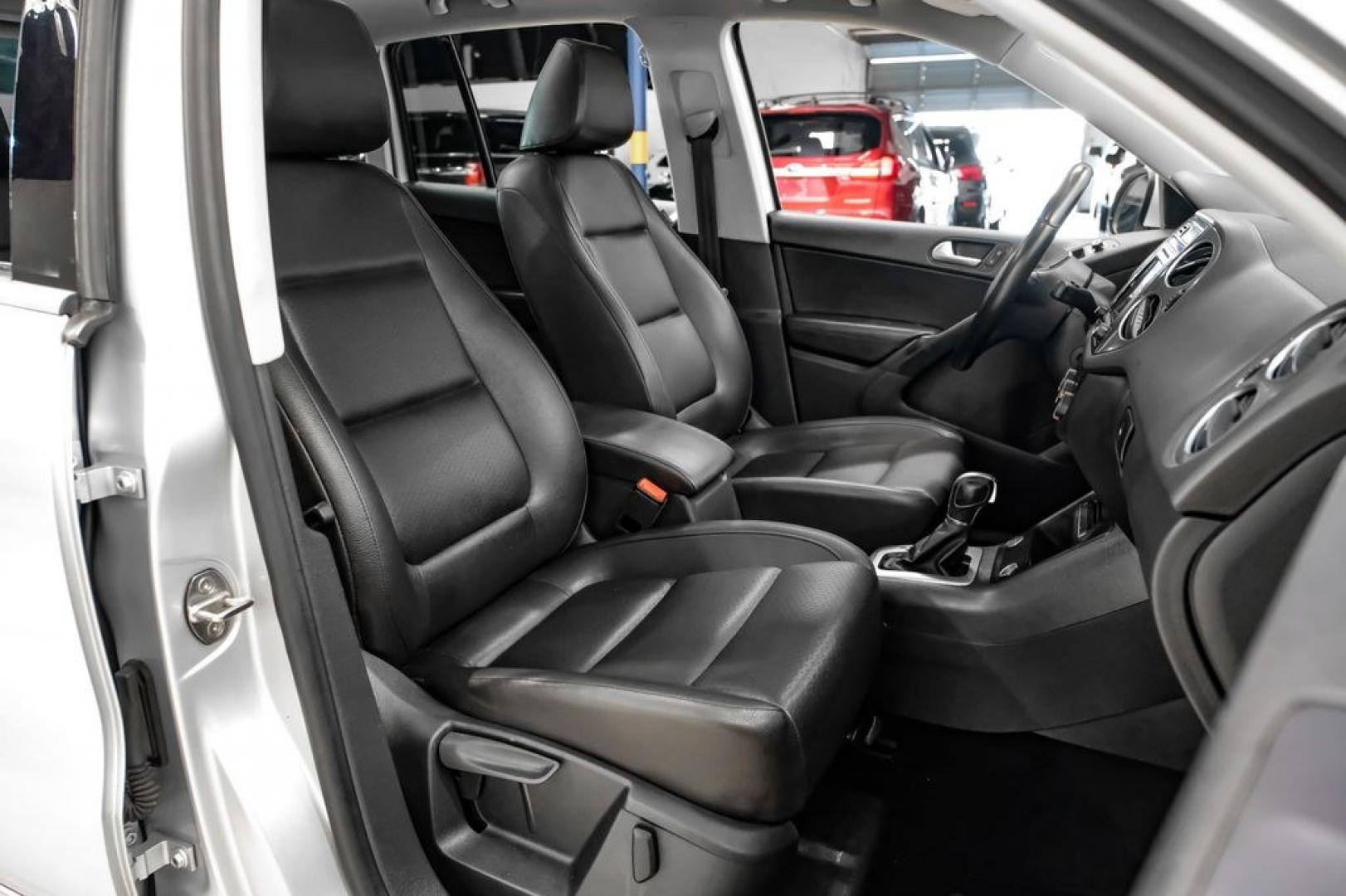 2017 Reflex Silver Metallic /Charcoal Black Volkswagen Tiguan 2.0T Wolfsburg Edition (WVGSV7AX8HK) with an 2.0L TSI DOHC engine, Automatic transmission, located at 15300 Midway Rd., Addison, TX, 75001, (972) 702-0011, 32.958321, -96.838074- Photo#30