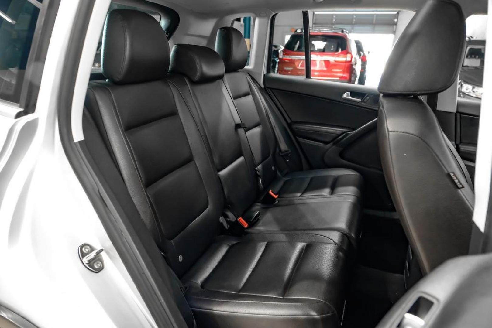 2017 Reflex Silver Metallic /Charcoal Black Volkswagen Tiguan 2.0T Wolfsburg Edition (WVGSV7AX8HK) with an 2.0L TSI DOHC engine, Automatic transmission, located at 15300 Midway Rd., Addison, TX, 75001, (972) 702-0011, 32.958321, -96.838074- Photo#31