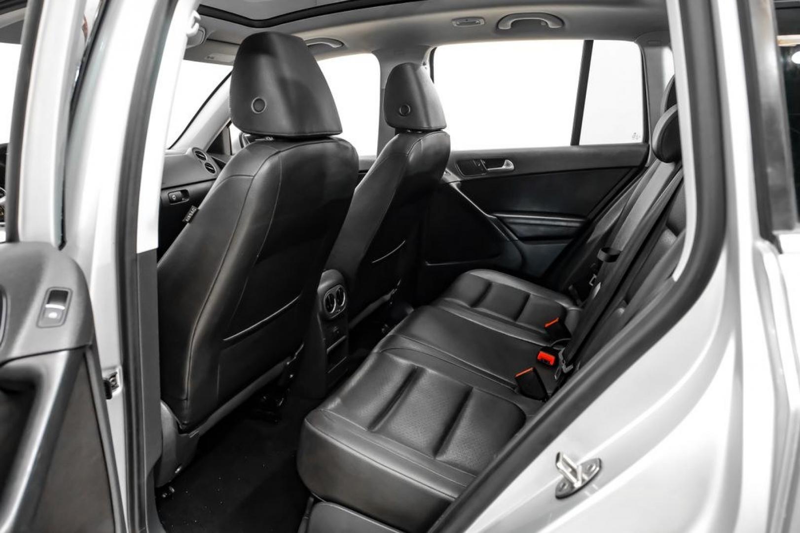 2017 Reflex Silver Metallic /Charcoal Black Volkswagen Tiguan 2.0T Wolfsburg Edition (WVGSV7AX8HK) with an 2.0L TSI DOHC engine, Automatic transmission, located at 15300 Midway Rd., Addison, TX, 75001, (972) 702-0011, 32.958321, -96.838074- Photo#33