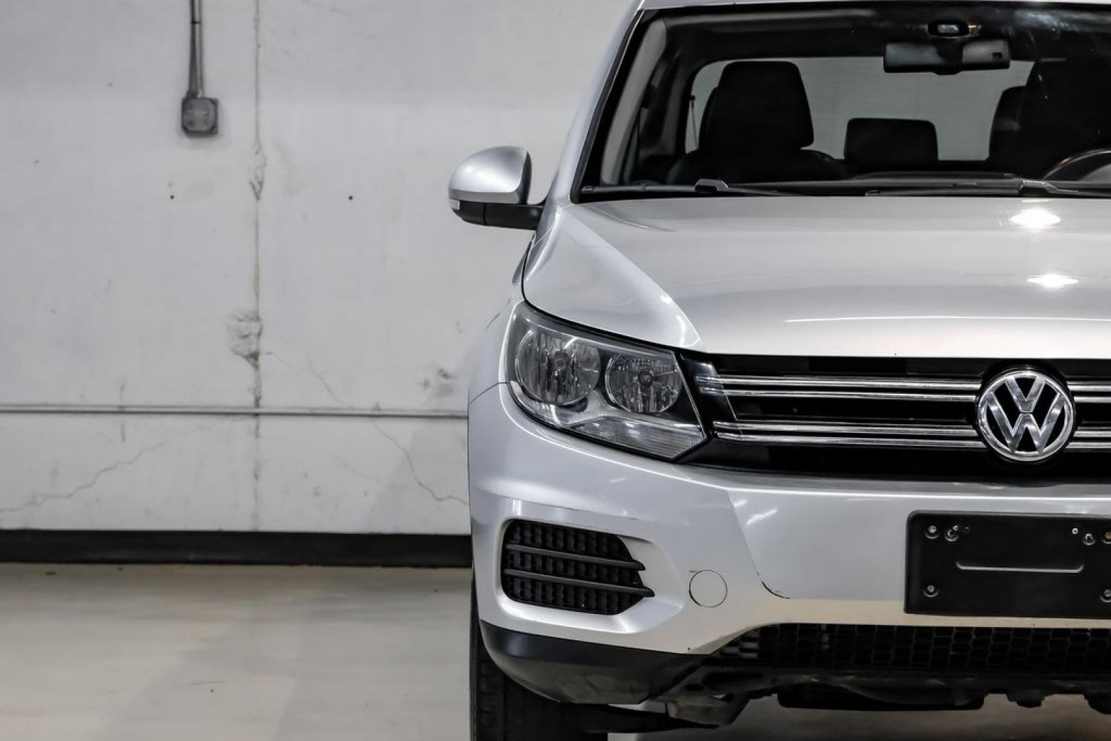2017 Reflex Silver Metallic /Charcoal Black Volkswagen Tiguan 2.0T Wolfsburg Edition (WVGSV7AX8HK) with an 2.0L TSI DOHC engine, Automatic transmission, located at 15300 Midway Rd., Addison, TX, 75001, (972) 702-0011, 32.958321, -96.838074- Photo#42
