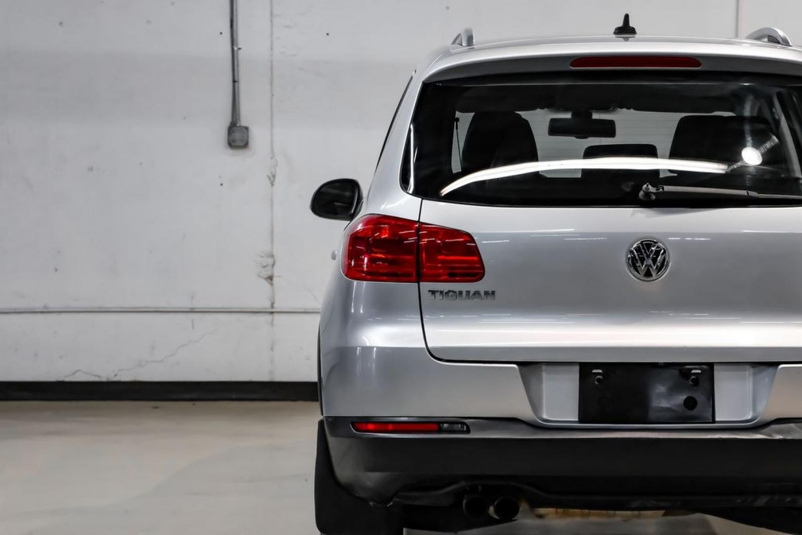 2017 Reflex Silver Metallic /Charcoal Black Volkswagen Tiguan 2.0T Wolfsburg Edition (WVGSV7AX8HK) with an 2.0L TSI DOHC engine, Automatic transmission, located at 15300 Midway Rd., Addison, TX, 75001, (972) 702-0011, 32.958321, -96.838074- Photo#43