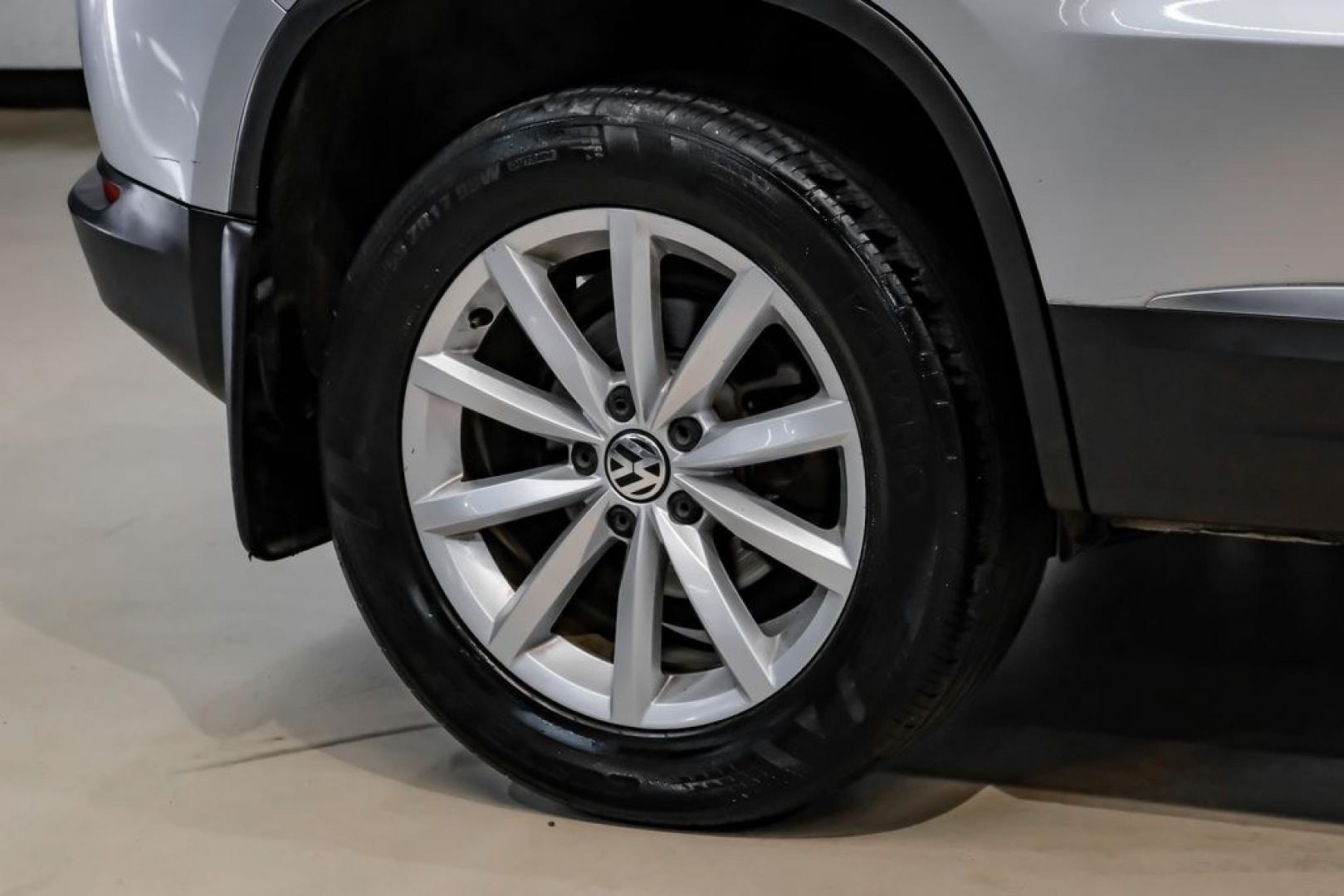 2017 Reflex Silver Metallic /Charcoal Black Volkswagen Tiguan 2.0T Wolfsburg Edition (WVGSV7AX8HK) with an 2.0L TSI DOHC engine, Automatic transmission, located at 15300 Midway Rd., Addison, TX, 75001, (972) 702-0011, 32.958321, -96.838074- Photo#49