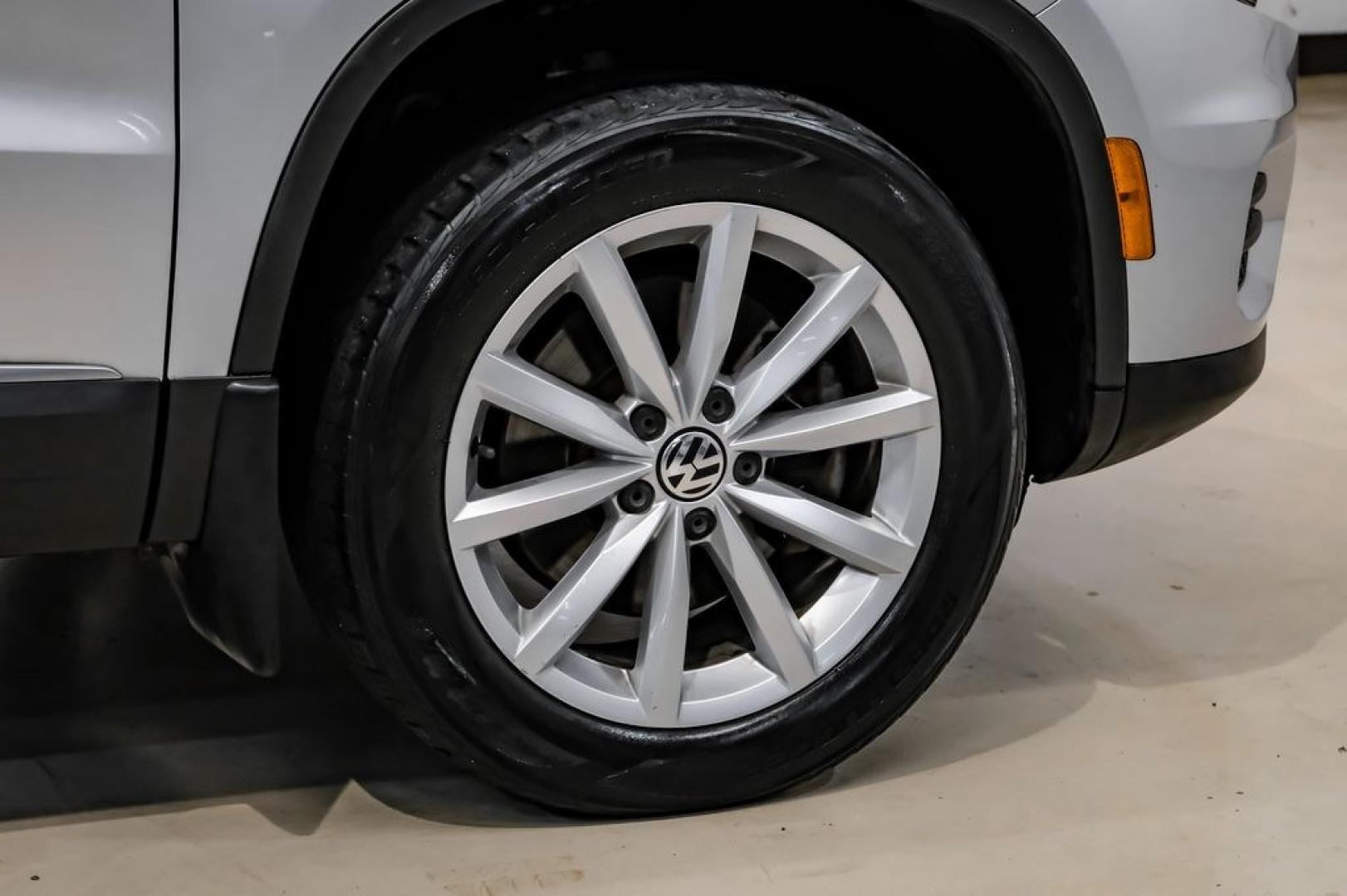 2017 Reflex Silver Metallic /Charcoal Black Volkswagen Tiguan 2.0T Wolfsburg Edition (WVGSV7AX8HK) with an 2.0L TSI DOHC engine, Automatic transmission, located at 15300 Midway Rd., Addison, TX, 75001, (972) 702-0011, 32.958321, -96.838074- Photo#50
