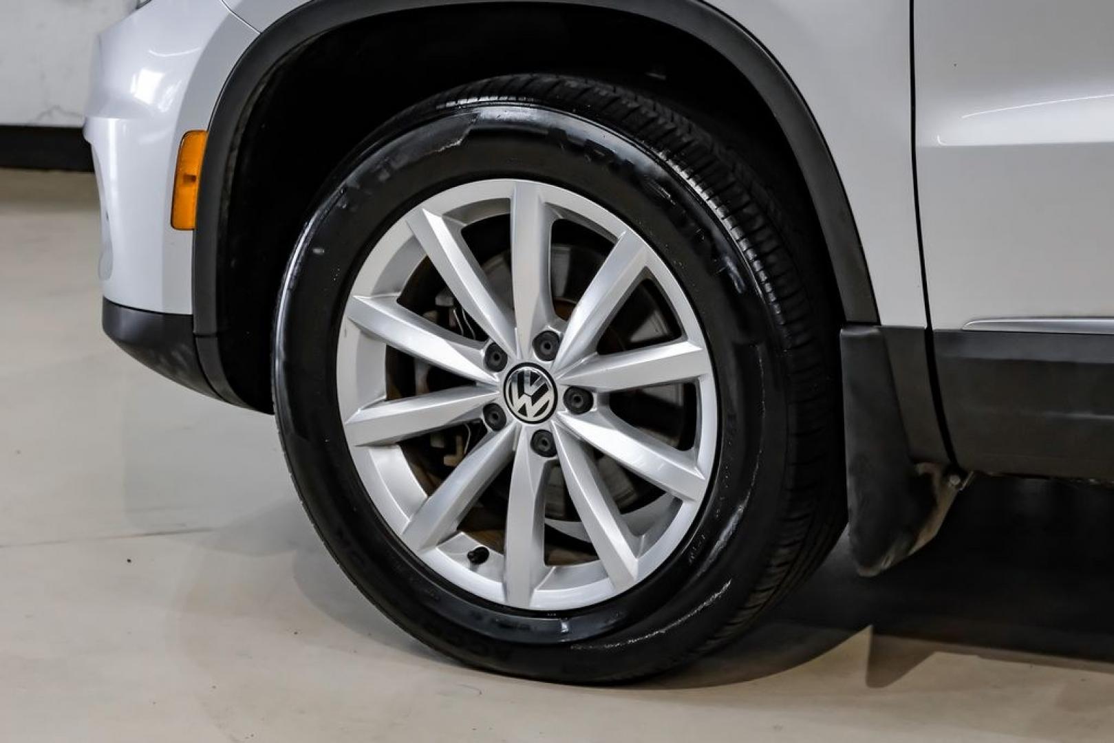 2017 Reflex Silver Metallic /Charcoal Black Volkswagen Tiguan 2.0T Wolfsburg Edition (WVGSV7AX8HK) with an 2.0L TSI DOHC engine, Automatic transmission, located at 15300 Midway Rd., Addison, TX, 75001, (972) 702-0011, 32.958321, -96.838074- Photo#51