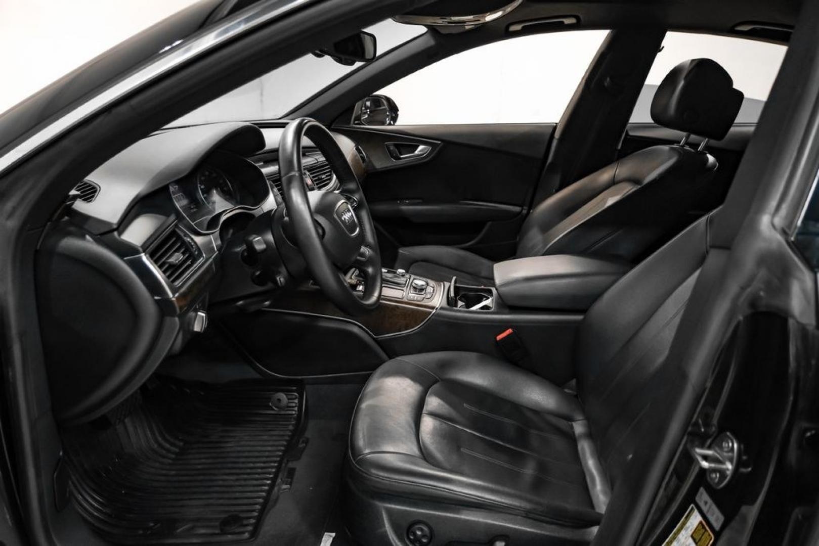 2013 Black Metallic /Black Audi A7 3.0T Premium Plus (WAUYGAFC2DN) with an 3.0L V6 TFSI DOHC Supercharged engine, Automatic transmission, located at 15300 Midway Rd., Addison, TX, 75001, (972) 702-0011, 32.958321, -96.838074 - HOME OF THE NO HAGGLE PRICE - WHOLESALE PRICES TO THE PUBLIC!! A7 3.0T Premium Plus quattro, 4D Hatchback, 3.0L V6 TFSI DOHC Supercharged, 8-Speed Automatic with Tiptronic, quattro, Brilliant Black, Black Leather. Odometer is 2918 miles below market average!Brilliant Black 2013 Audi A7 3.0T Premium- Photo#2
