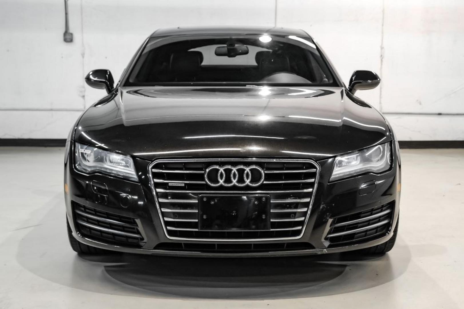 2013 Black Metallic /Black Audi A7 3.0T Premium Plus (WAUYGAFC2DN) with an 3.0L V6 TFSI DOHC Supercharged engine, Automatic transmission, located at 15300 Midway Rd., Addison, TX, 75001, (972) 702-0011, 32.958321, -96.838074 - HOME OF THE NO HAGGLE PRICE - WHOLESALE PRICES TO THE PUBLIC!! A7 3.0T Premium Plus quattro, 4D Hatchback, 3.0L V6 TFSI DOHC Supercharged, 8-Speed Automatic with Tiptronic, quattro, Brilliant Black, Black Leather. Odometer is 2918 miles below market average!Brilliant Black 2013 Audi A7 3.0T Premium- Photo#4