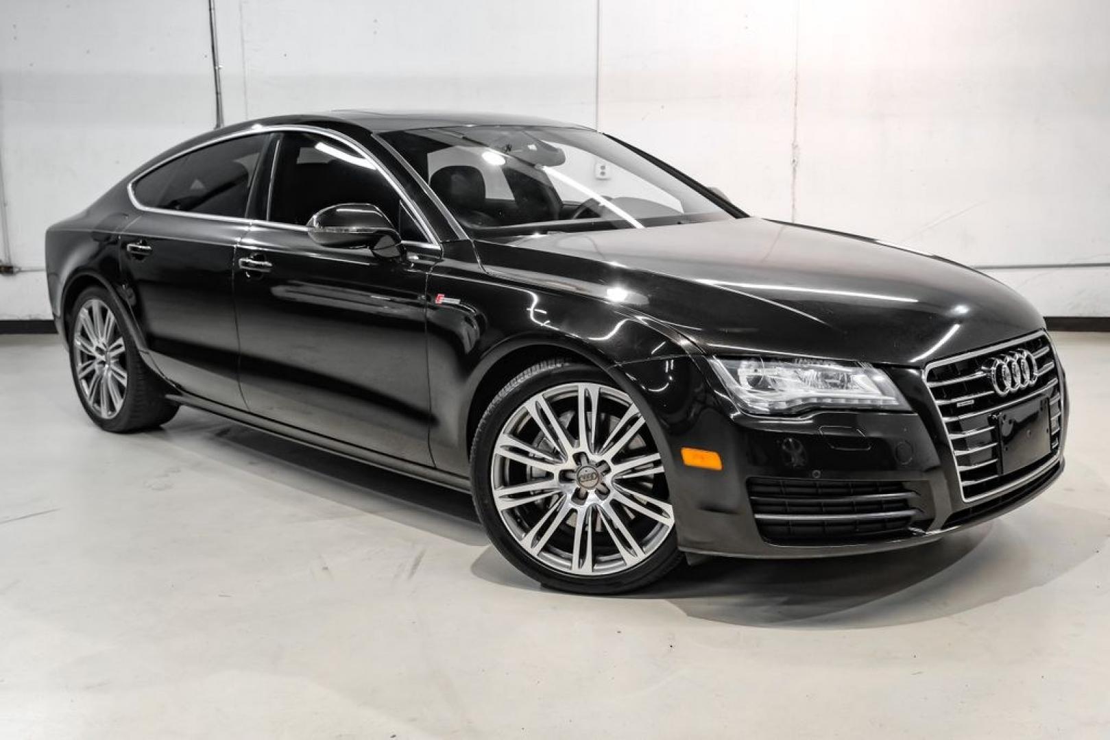 2013 Black Metallic /Black Audi A7 3.0T Premium Plus (WAUYGAFC2DN) with an 3.0L V6 TFSI DOHC Supercharged engine, Automatic transmission, located at 15300 Midway Rd., Addison, TX, 75001, (972) 702-0011, 32.958321, -96.838074 - HOME OF THE NO HAGGLE PRICE - WHOLESALE PRICES TO THE PUBLIC!! A7 3.0T Premium Plus quattro, 4D Hatchback, 3.0L V6 TFSI DOHC Supercharged, 8-Speed Automatic with Tiptronic, quattro, Brilliant Black, Black Leather. Odometer is 2918 miles below market average!Brilliant Black 2013 Audi A7 3.0T Premium- Photo#5