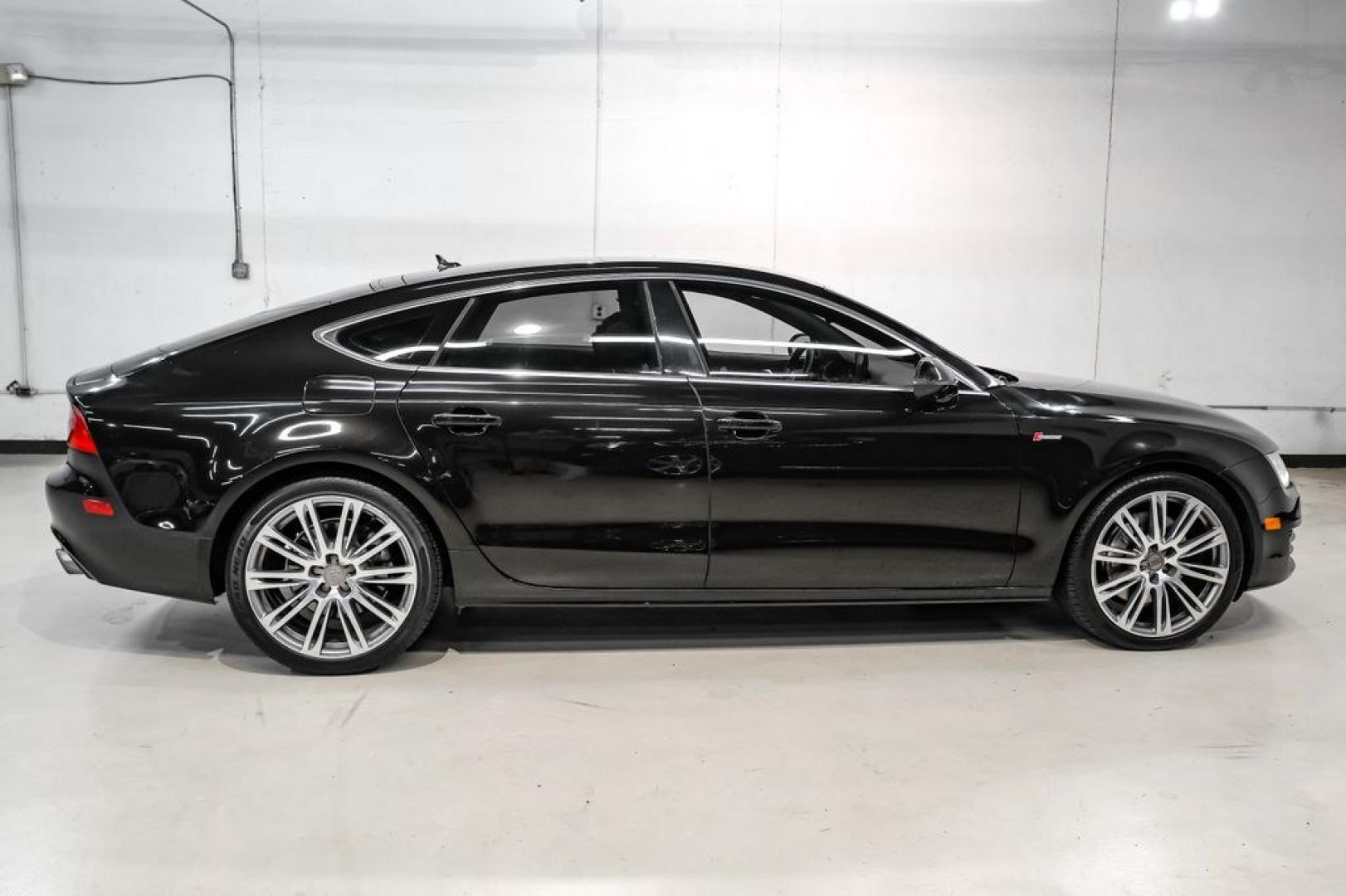 2013 Black Metallic /Black Audi A7 3.0T Premium Plus (WAUYGAFC2DN) with an 3.0L V6 TFSI DOHC Supercharged engine, Automatic transmission, located at 15300 Midway Rd., Addison, TX, 75001, (972) 702-0011, 32.958321, -96.838074 - HOME OF THE NO HAGGLE PRICE - WHOLESALE PRICES TO THE PUBLIC!! A7 3.0T Premium Plus quattro, 4D Hatchback, 3.0L V6 TFSI DOHC Supercharged, 8-Speed Automatic with Tiptronic, quattro, Brilliant Black, Black Leather. Odometer is 2918 miles below market average!Brilliant Black 2013 Audi A7 3.0T Premium- Photo#6