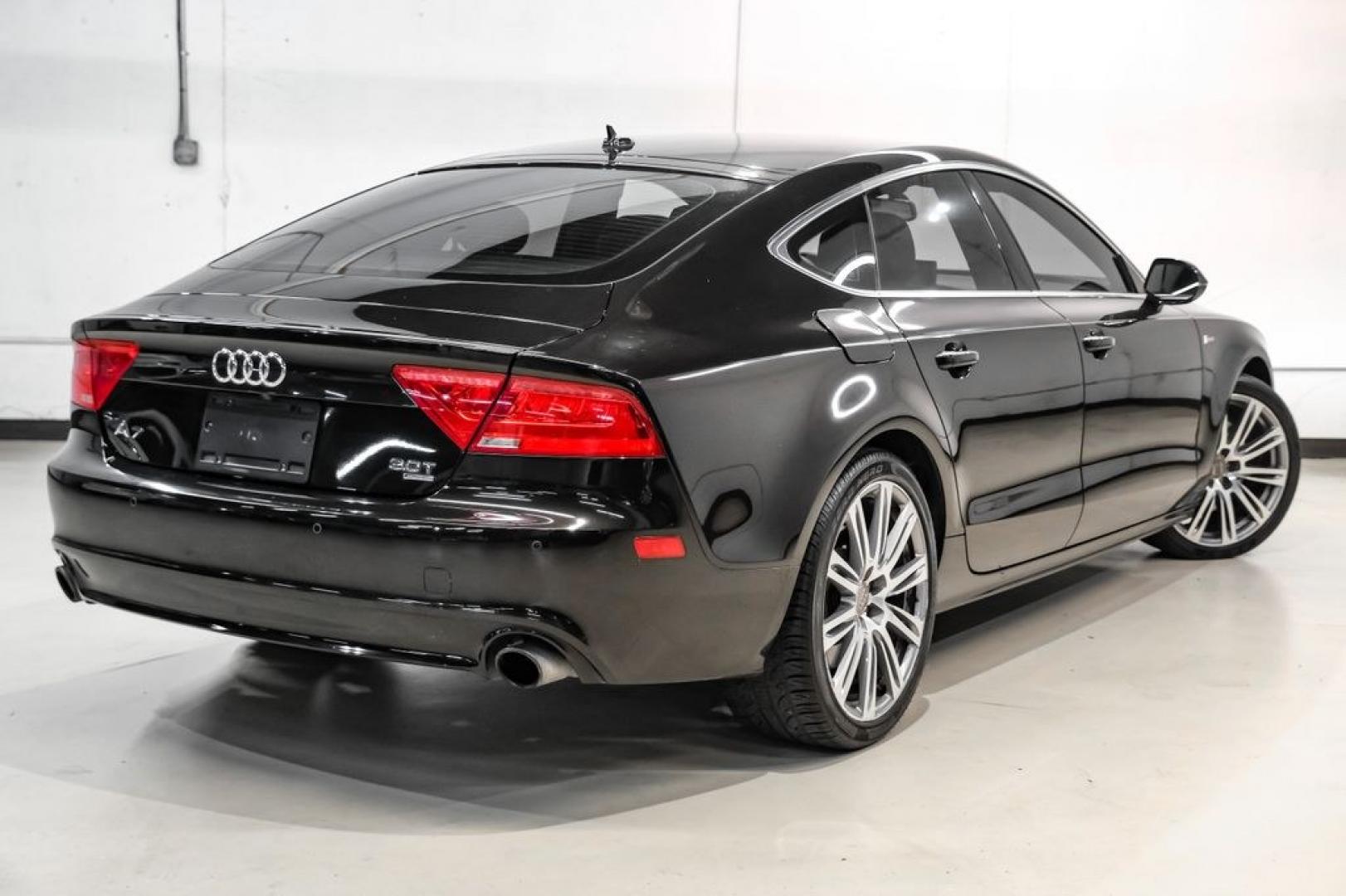 2013 Black Metallic /Black Audi A7 3.0T Premium Plus (WAUYGAFC2DN) with an 3.0L V6 TFSI DOHC Supercharged engine, Automatic transmission, located at 15300 Midway Rd., Addison, TX, 75001, (972) 702-0011, 32.958321, -96.838074 - HOME OF THE NO HAGGLE PRICE - WHOLESALE PRICES TO THE PUBLIC!! A7 3.0T Premium Plus quattro, 4D Hatchback, 3.0L V6 TFSI DOHC Supercharged, 8-Speed Automatic with Tiptronic, quattro, Brilliant Black, Black Leather. Odometer is 2918 miles below market average!Brilliant Black 2013 Audi A7 3.0T Premium- Photo#7
