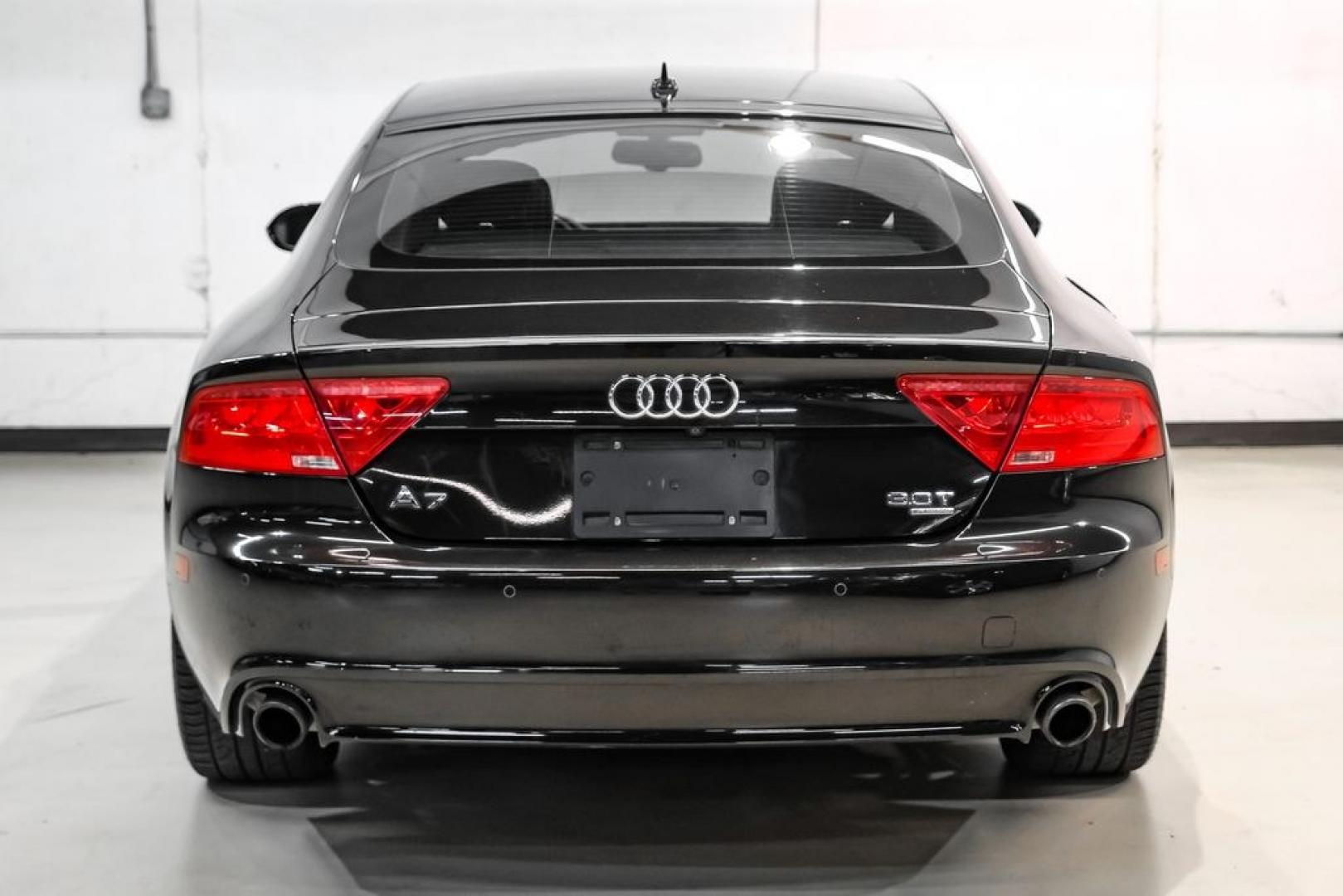 2013 Black Metallic /Black Audi A7 3.0T Premium Plus (WAUYGAFC2DN) with an 3.0L V6 TFSI DOHC Supercharged engine, Automatic transmission, located at 15300 Midway Rd., Addison, TX, 75001, (972) 702-0011, 32.958321, -96.838074 - HOME OF THE NO HAGGLE PRICE - WHOLESALE PRICES TO THE PUBLIC!! A7 3.0T Premium Plus quattro, 4D Hatchback, 3.0L V6 TFSI DOHC Supercharged, 8-Speed Automatic with Tiptronic, quattro, Brilliant Black, Black Leather. Odometer is 2918 miles below market average!Brilliant Black 2013 Audi A7 3.0T Premium- Photo#8