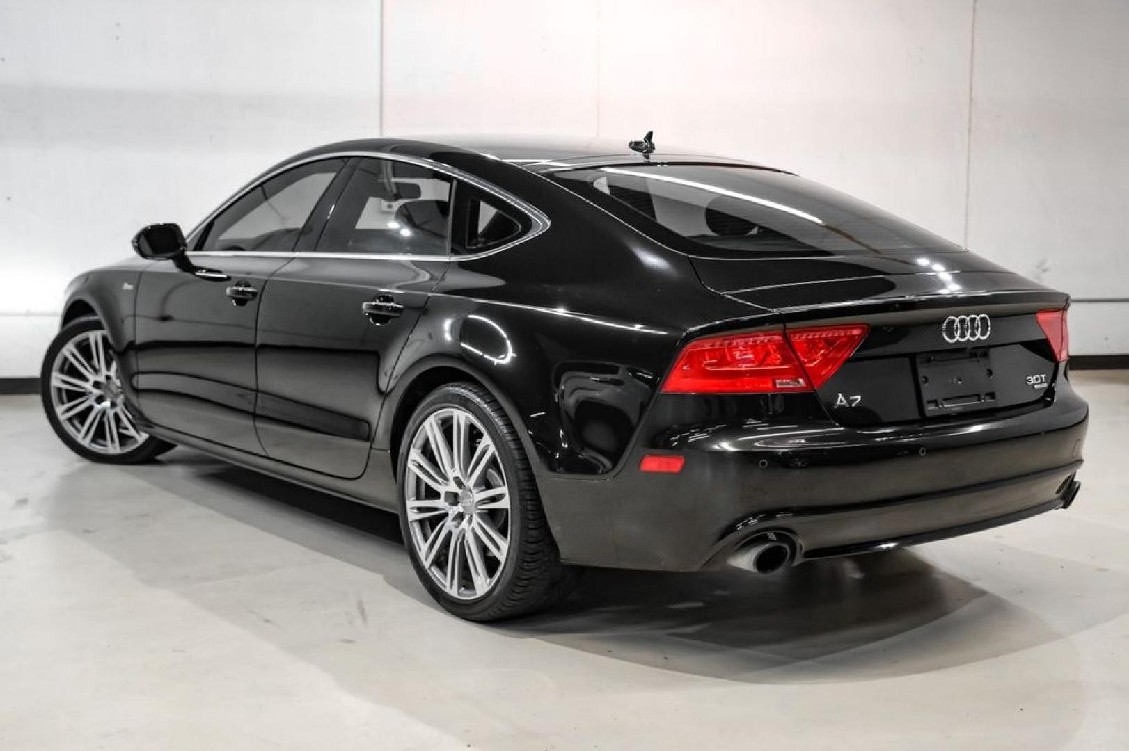 2013 Black Metallic /Black Audi A7 3.0T Premium Plus (WAUYGAFC2DN) with an 3.0L V6 TFSI DOHC Supercharged engine, Automatic transmission, located at 15300 Midway Rd., Addison, TX, 75001, (972) 702-0011, 32.958321, -96.838074 - HOME OF THE NO HAGGLE PRICE - WHOLESALE PRICES TO THE PUBLIC!! A7 3.0T Premium Plus quattro, 4D Hatchback, 3.0L V6 TFSI DOHC Supercharged, 8-Speed Automatic with Tiptronic, quattro, Brilliant Black, Black Leather. Odometer is 2918 miles below market average!Brilliant Black 2013 Audi A7 3.0T Premium- Photo#9