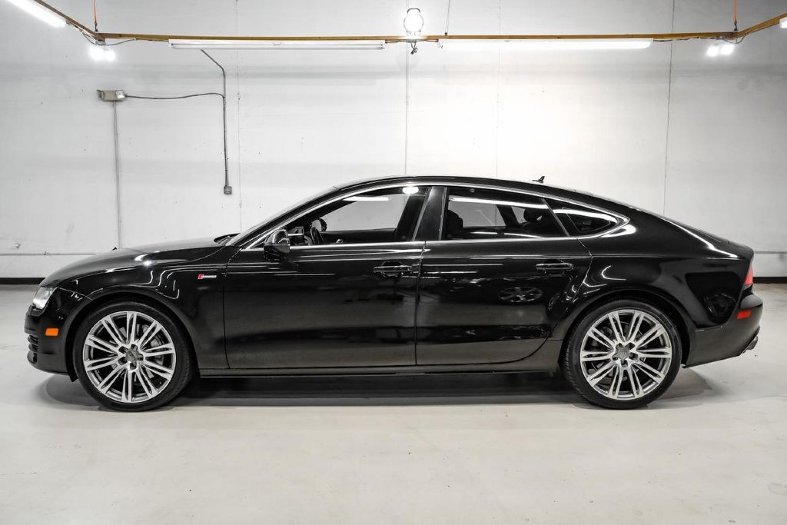 2013 Black Metallic /Black Audi A7 3.0T Premium Plus (WAUYGAFC2DN) with an 3.0L V6 TFSI DOHC Supercharged engine, Automatic transmission, located at 15300 Midway Rd., Addison, TX, 75001, (972) 702-0011, 32.958321, -96.838074 - HOME OF THE NO HAGGLE PRICE - WHOLESALE PRICES TO THE PUBLIC!! A7 3.0T Premium Plus quattro, 4D Hatchback, 3.0L V6 TFSI DOHC Supercharged, 8-Speed Automatic with Tiptronic, quattro, Brilliant Black, Black Leather. Odometer is 2918 miles below market average!Brilliant Black 2013 Audi A7 3.0T Premium- Photo#10