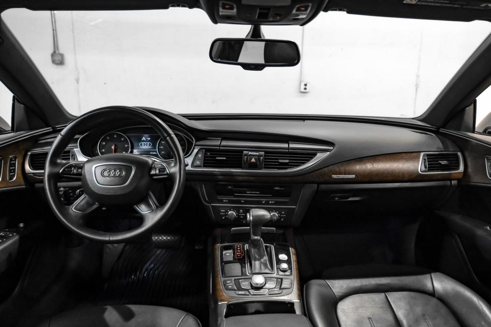 2013 Black Metallic /Black Audi A7 3.0T Premium Plus (WAUYGAFC2DN) with an 3.0L V6 TFSI DOHC Supercharged engine, Automatic transmission, located at 15300 Midway Rd., Addison, TX, 75001, (972) 702-0011, 32.958321, -96.838074 - HOME OF THE NO HAGGLE PRICE - WHOLESALE PRICES TO THE PUBLIC!! A7 3.0T Premium Plus quattro, 4D Hatchback, 3.0L V6 TFSI DOHC Supercharged, 8-Speed Automatic with Tiptronic, quattro, Brilliant Black, Black Leather. Odometer is 2918 miles below market average!Brilliant Black 2013 Audi A7 3.0T Premium- Photo#12