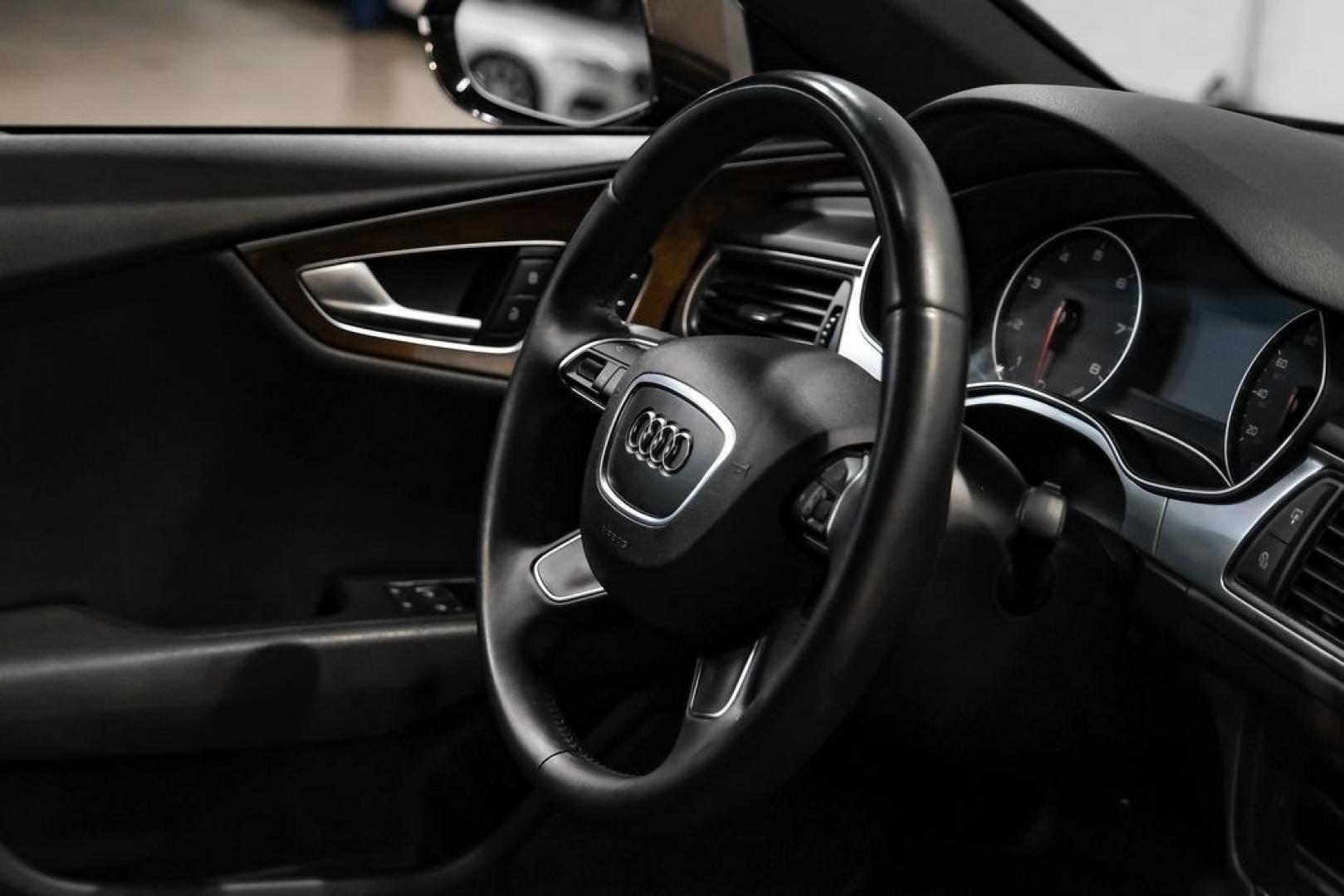 2013 Black Metallic /Black Audi A7 3.0T Premium Plus (WAUYGAFC2DN) with an 3.0L V6 TFSI DOHC Supercharged engine, Automatic transmission, located at 15300 Midway Rd., Addison, TX, 75001, (972) 702-0011, 32.958321, -96.838074 - HOME OF THE NO HAGGLE PRICE - WHOLESALE PRICES TO THE PUBLIC!! A7 3.0T Premium Plus quattro, 4D Hatchback, 3.0L V6 TFSI DOHC Supercharged, 8-Speed Automatic with Tiptronic, quattro, Brilliant Black, Black Leather. Odometer is 2918 miles below market average!Brilliant Black 2013 Audi A7 3.0T Premium- Photo#13