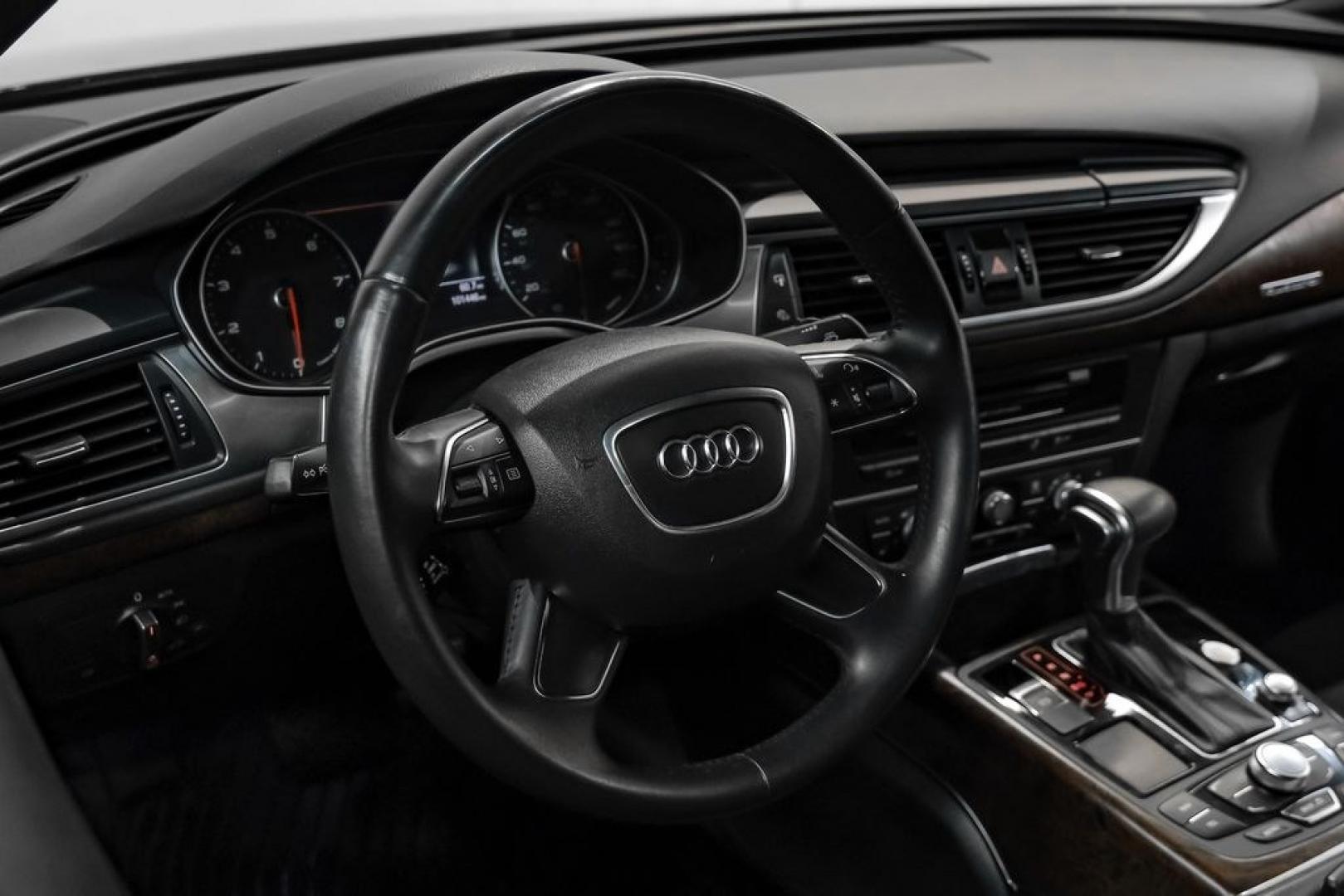2013 Black Metallic /Black Audi A7 3.0T Premium Plus (WAUYGAFC2DN) with an 3.0L V6 TFSI DOHC Supercharged engine, Automatic transmission, located at 15300 Midway Rd., Addison, TX, 75001, (972) 702-0011, 32.958321, -96.838074 - HOME OF THE NO HAGGLE PRICE - WHOLESALE PRICES TO THE PUBLIC!! A7 3.0T Premium Plus quattro, 4D Hatchback, 3.0L V6 TFSI DOHC Supercharged, 8-Speed Automatic with Tiptronic, quattro, Brilliant Black, Black Leather. Odometer is 2918 miles below market average!Brilliant Black 2013 Audi A7 3.0T Premium- Photo#14