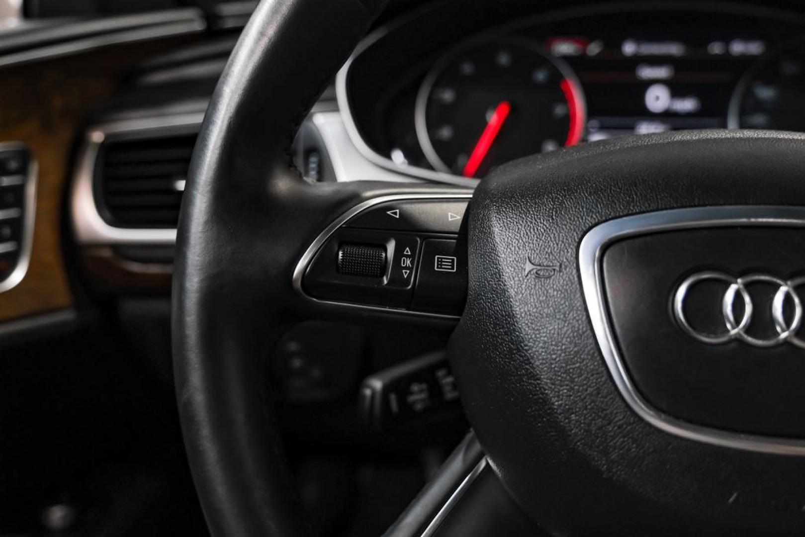 2013 Black Metallic /Black Audi A7 3.0T Premium Plus (WAUYGAFC2DN) with an 3.0L V6 TFSI DOHC Supercharged engine, Automatic transmission, located at 15300 Midway Rd., Addison, TX, 75001, (972) 702-0011, 32.958321, -96.838074 - HOME OF THE NO HAGGLE PRICE - WHOLESALE PRICES TO THE PUBLIC!! A7 3.0T Premium Plus quattro, 4D Hatchback, 3.0L V6 TFSI DOHC Supercharged, 8-Speed Automatic with Tiptronic, quattro, Brilliant Black, Black Leather. Odometer is 2918 miles below market average!Brilliant Black 2013 Audi A7 3.0T Premium- Photo#15