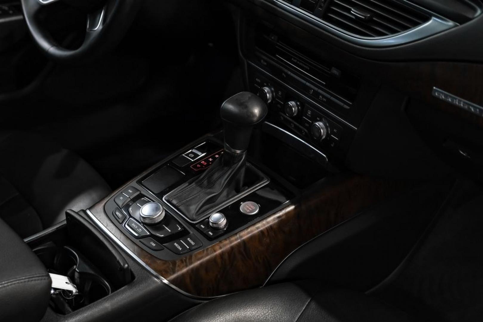 2013 Black Metallic /Black Audi A7 3.0T Premium Plus (WAUYGAFC2DN) with an 3.0L V6 TFSI DOHC Supercharged engine, Automatic transmission, located at 15300 Midway Rd., Addison, TX, 75001, (972) 702-0011, 32.958321, -96.838074 - HOME OF THE NO HAGGLE PRICE - WHOLESALE PRICES TO THE PUBLIC!! A7 3.0T Premium Plus quattro, 4D Hatchback, 3.0L V6 TFSI DOHC Supercharged, 8-Speed Automatic with Tiptronic, quattro, Brilliant Black, Black Leather. Odometer is 2918 miles below market average!Brilliant Black 2013 Audi A7 3.0T Premium- Photo#22