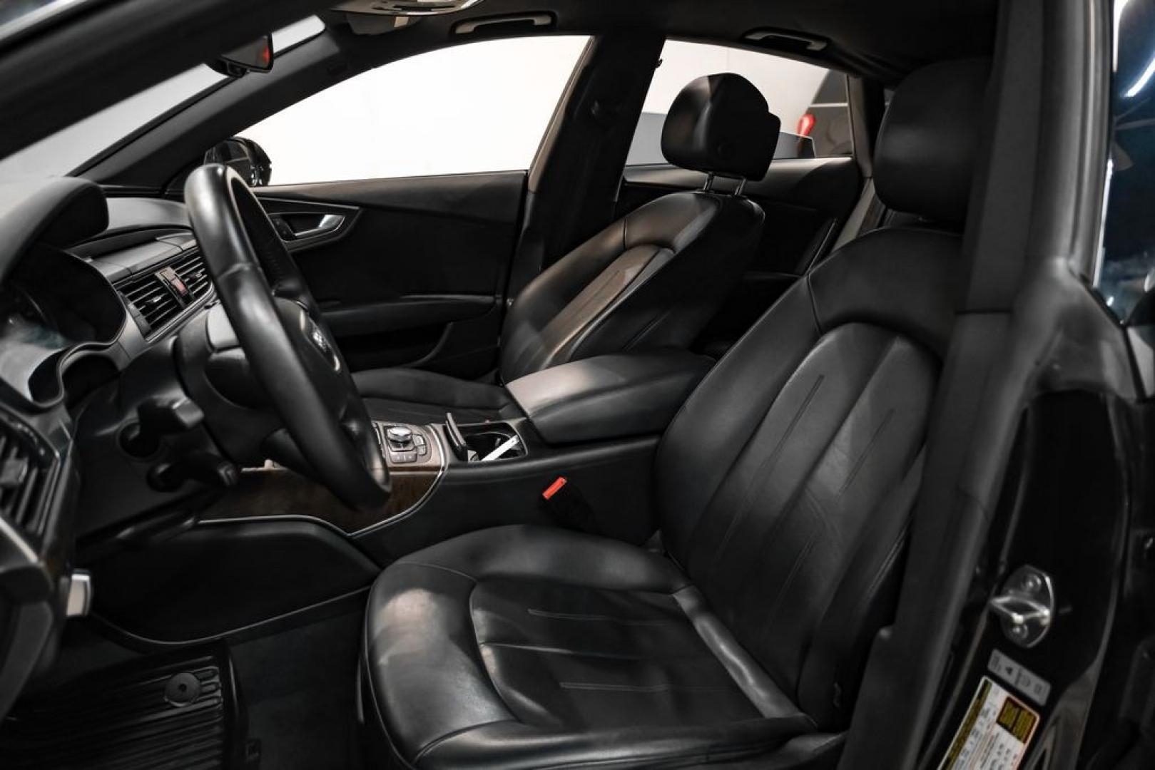 2013 Black Metallic /Black Audi A7 3.0T Premium Plus (WAUYGAFC2DN) with an 3.0L V6 TFSI DOHC Supercharged engine, Automatic transmission, located at 15300 Midway Rd., Addison, TX, 75001, (972) 702-0011, 32.958321, -96.838074 - HOME OF THE NO HAGGLE PRICE - WHOLESALE PRICES TO THE PUBLIC!! A7 3.0T Premium Plus quattro, 4D Hatchback, 3.0L V6 TFSI DOHC Supercharged, 8-Speed Automatic with Tiptronic, quattro, Brilliant Black, Black Leather. Odometer is 2918 miles below market average!Brilliant Black 2013 Audi A7 3.0T Premium- Photo#33