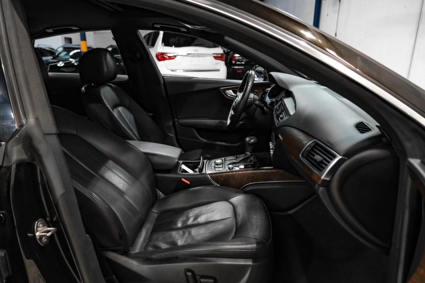 2013 Black Metallic /Black Audi A7 3.0T Premium Plus (WAUYGAFC2DN) with an 3.0L V6 TFSI DOHC Supercharged engine, Automatic transmission, located at 15300 Midway Rd., Addison, TX, 75001, (972) 702-0011, 32.958321, -96.838074 - HOME OF THE NO HAGGLE PRICE - WHOLESALE PRICES TO THE PUBLIC!! A7 3.0T Premium Plus quattro, 4D Hatchback, 3.0L V6 TFSI DOHC Supercharged, 8-Speed Automatic with Tiptronic, quattro, Brilliant Black, Black Leather. Odometer is 2918 miles below market average!Brilliant Black 2013 Audi A7 3.0T Premium- Photo#34