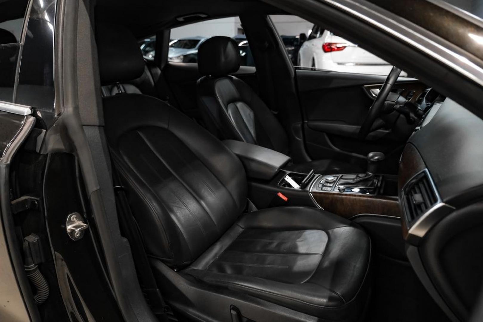 2013 Black Metallic /Black Audi A7 3.0T Premium Plus (WAUYGAFC2DN) with an 3.0L V6 TFSI DOHC Supercharged engine, Automatic transmission, located at 15300 Midway Rd., Addison, TX, 75001, (972) 702-0011, 32.958321, -96.838074 - HOME OF THE NO HAGGLE PRICE - WHOLESALE PRICES TO THE PUBLIC!! A7 3.0T Premium Plus quattro, 4D Hatchback, 3.0L V6 TFSI DOHC Supercharged, 8-Speed Automatic with Tiptronic, quattro, Brilliant Black, Black Leather. Odometer is 2918 miles below market average!Brilliant Black 2013 Audi A7 3.0T Premium- Photo#35