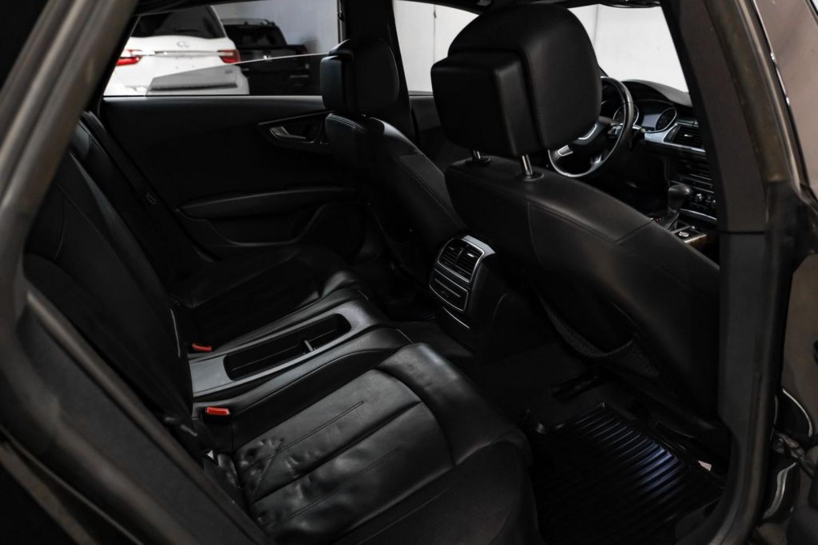 2013 Black Metallic /Black Audi A7 3.0T Premium Plus (WAUYGAFC2DN) with an 3.0L V6 TFSI DOHC Supercharged engine, Automatic transmission, located at 15300 Midway Rd., Addison, TX, 75001, (972) 702-0011, 32.958321, -96.838074 - HOME OF THE NO HAGGLE PRICE - WHOLESALE PRICES TO THE PUBLIC!! A7 3.0T Premium Plus quattro, 4D Hatchback, 3.0L V6 TFSI DOHC Supercharged, 8-Speed Automatic with Tiptronic, quattro, Brilliant Black, Black Leather. Odometer is 2918 miles below market average!Brilliant Black 2013 Audi A7 3.0T Premium- Photo#37