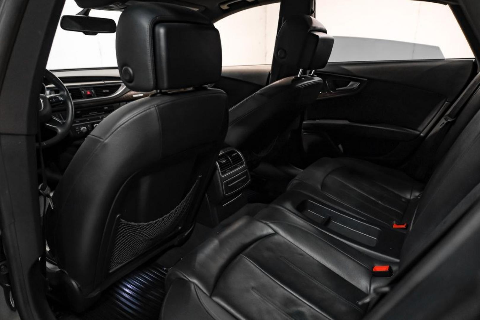 2013 Black Metallic /Black Audi A7 3.0T Premium Plus (WAUYGAFC2DN) with an 3.0L V6 TFSI DOHC Supercharged engine, Automatic transmission, located at 15300 Midway Rd., Addison, TX, 75001, (972) 702-0011, 32.958321, -96.838074 - HOME OF THE NO HAGGLE PRICE - WHOLESALE PRICES TO THE PUBLIC!! A7 3.0T Premium Plus quattro, 4D Hatchback, 3.0L V6 TFSI DOHC Supercharged, 8-Speed Automatic with Tiptronic, quattro, Brilliant Black, Black Leather. Odometer is 2918 miles below market average!Brilliant Black 2013 Audi A7 3.0T Premium- Photo#38