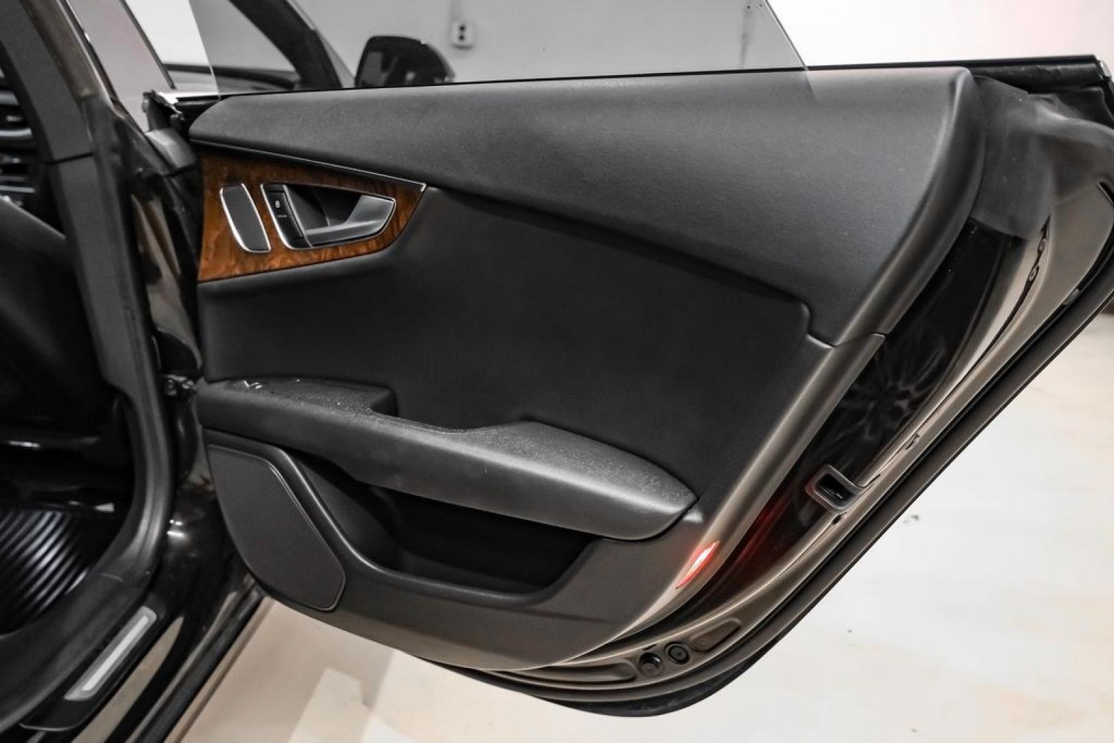 2013 Black Metallic /Black Audi A7 3.0T Premium Plus (WAUYGAFC2DN) with an 3.0L V6 TFSI DOHC Supercharged engine, Automatic transmission, located at 15300 Midway Rd., Addison, TX, 75001, (972) 702-0011, 32.958321, -96.838074 - HOME OF THE NO HAGGLE PRICE - WHOLESALE PRICES TO THE PUBLIC!! A7 3.0T Premium Plus quattro, 4D Hatchback, 3.0L V6 TFSI DOHC Supercharged, 8-Speed Automatic with Tiptronic, quattro, Brilliant Black, Black Leather. Odometer is 2918 miles below market average!Brilliant Black 2013 Audi A7 3.0T Premium- Photo#45