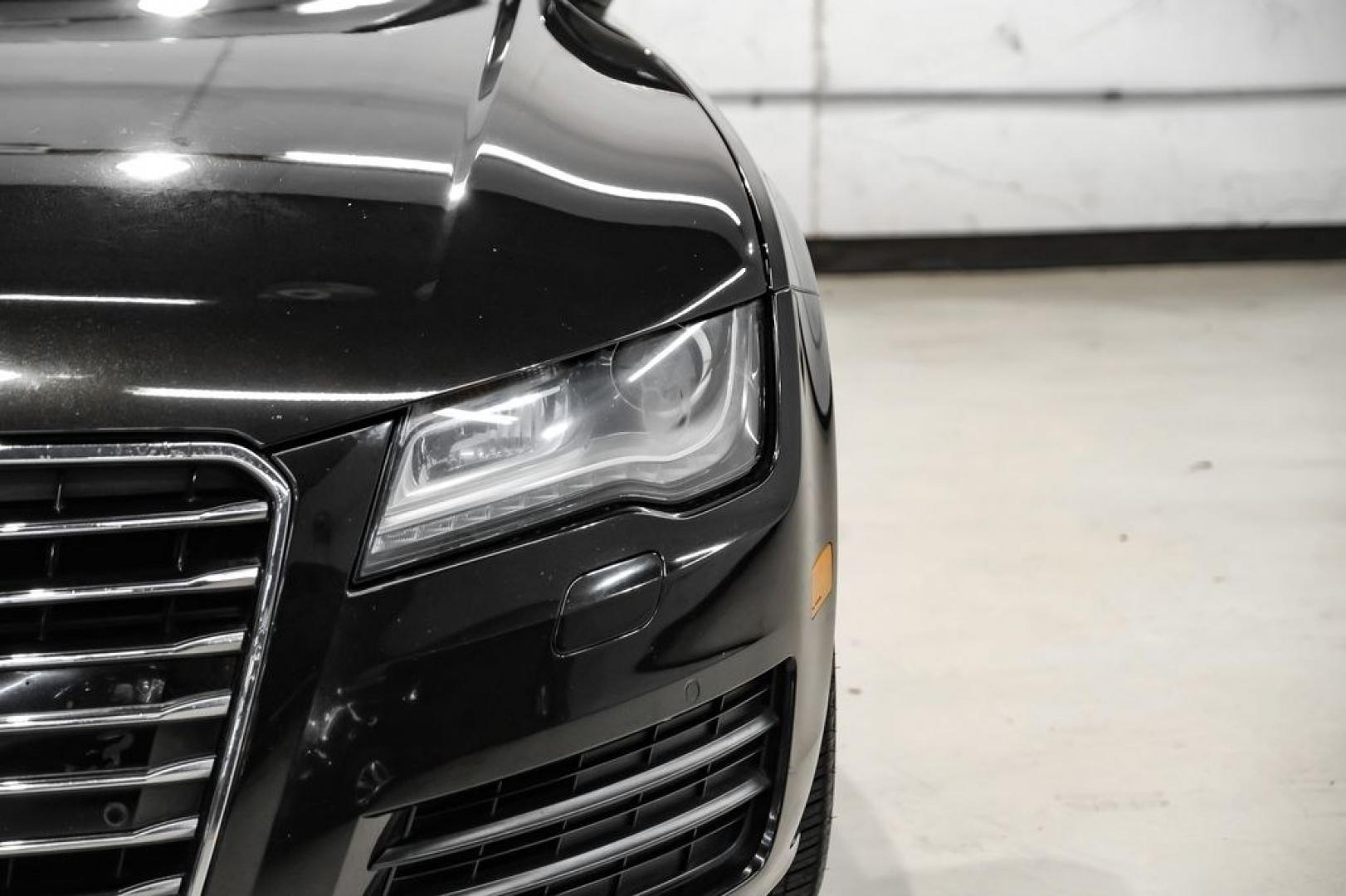 2013 Black Metallic /Black Audi A7 3.0T Premium Plus (WAUYGAFC2DN) with an 3.0L V6 TFSI DOHC Supercharged engine, Automatic transmission, located at 15300 Midway Rd., Addison, TX, 75001, (972) 702-0011, 32.958321, -96.838074 - HOME OF THE NO HAGGLE PRICE - WHOLESALE PRICES TO THE PUBLIC!! A7 3.0T Premium Plus quattro, 4D Hatchback, 3.0L V6 TFSI DOHC Supercharged, 8-Speed Automatic with Tiptronic, quattro, Brilliant Black, Black Leather. Odometer is 2918 miles below market average!Brilliant Black 2013 Audi A7 3.0T Premium- Photo#46