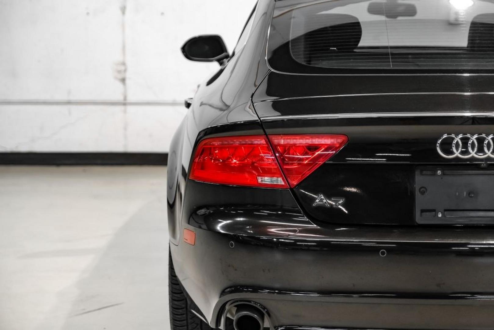 2013 Black Metallic /Black Audi A7 3.0T Premium Plus (WAUYGAFC2DN) with an 3.0L V6 TFSI DOHC Supercharged engine, Automatic transmission, located at 15300 Midway Rd., Addison, TX, 75001, (972) 702-0011, 32.958321, -96.838074 - HOME OF THE NO HAGGLE PRICE - WHOLESALE PRICES TO THE PUBLIC!! A7 3.0T Premium Plus quattro, 4D Hatchback, 3.0L V6 TFSI DOHC Supercharged, 8-Speed Automatic with Tiptronic, quattro, Brilliant Black, Black Leather. Odometer is 2918 miles below market average!Brilliant Black 2013 Audi A7 3.0T Premium- Photo#47