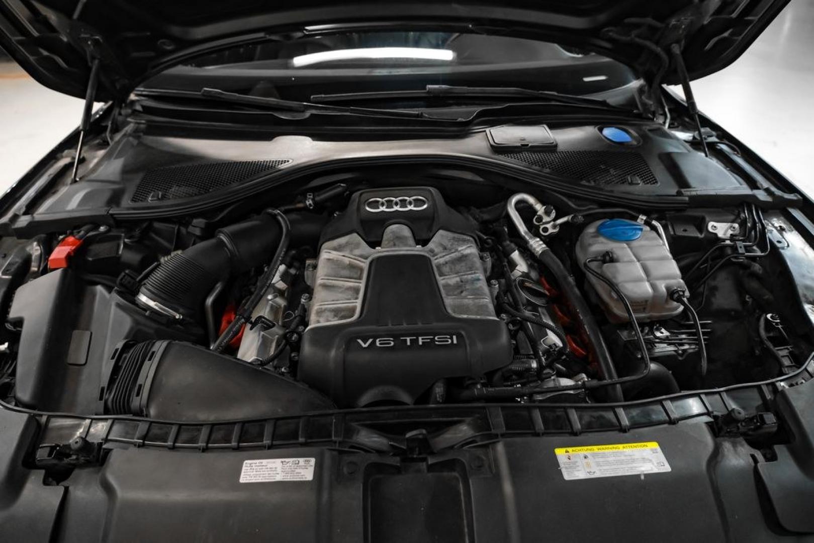 2013 Black Metallic /Black Audi A7 3.0T Premium Plus (WAUYGAFC2DN) with an 3.0L V6 TFSI DOHC Supercharged engine, Automatic transmission, located at 15300 Midway Rd., Addison, TX, 75001, (972) 702-0011, 32.958321, -96.838074 - HOME OF THE NO HAGGLE PRICE - WHOLESALE PRICES TO THE PUBLIC!! A7 3.0T Premium Plus quattro, 4D Hatchback, 3.0L V6 TFSI DOHC Supercharged, 8-Speed Automatic with Tiptronic, quattro, Brilliant Black, Black Leather. Odometer is 2918 miles below market average!Brilliant Black 2013 Audi A7 3.0T Premium- Photo#50