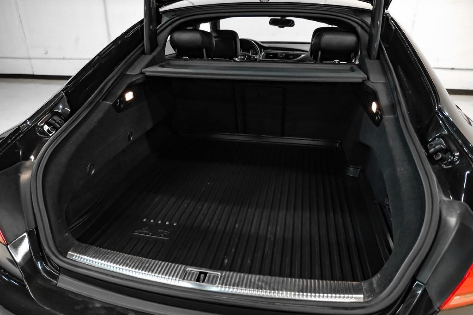 2013 Black Metallic /Black Audi A7 3.0T Premium Plus (WAUYGAFC2DN) with an 3.0L V6 TFSI DOHC Supercharged engine, Automatic transmission, located at 15300 Midway Rd., Addison, TX, 75001, (972) 702-0011, 32.958321, -96.838074 - HOME OF THE NO HAGGLE PRICE - WHOLESALE PRICES TO THE PUBLIC!! A7 3.0T Premium Plus quattro, 4D Hatchback, 3.0L V6 TFSI DOHC Supercharged, 8-Speed Automatic with Tiptronic, quattro, Brilliant Black, Black Leather. Odometer is 2918 miles below market average!Brilliant Black 2013 Audi A7 3.0T Premium- Photo#52