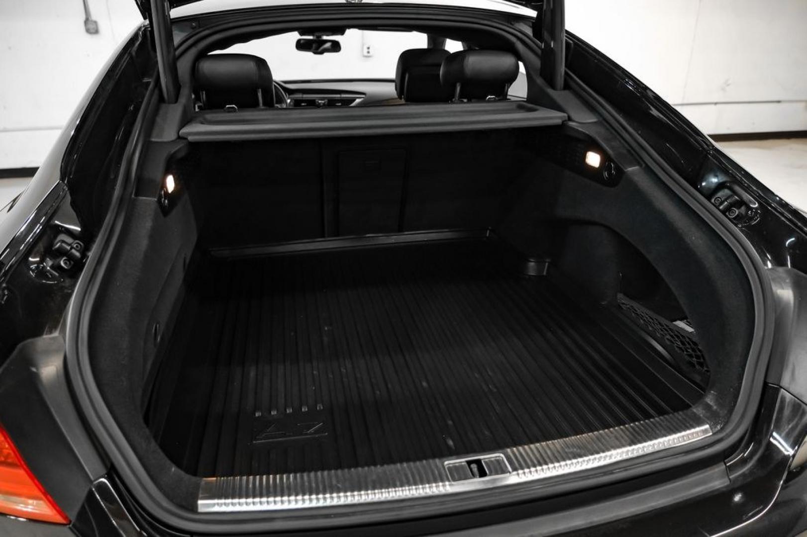 2013 Black Metallic /Black Audi A7 3.0T Premium Plus (WAUYGAFC2DN) with an 3.0L V6 TFSI DOHC Supercharged engine, Automatic transmission, located at 15300 Midway Rd., Addison, TX, 75001, (972) 702-0011, 32.958321, -96.838074 - HOME OF THE NO HAGGLE PRICE - WHOLESALE PRICES TO THE PUBLIC!! A7 3.0T Premium Plus quattro, 4D Hatchback, 3.0L V6 TFSI DOHC Supercharged, 8-Speed Automatic with Tiptronic, quattro, Brilliant Black, Black Leather. Odometer is 2918 miles below market average!Brilliant Black 2013 Audi A7 3.0T Premium- Photo#53
