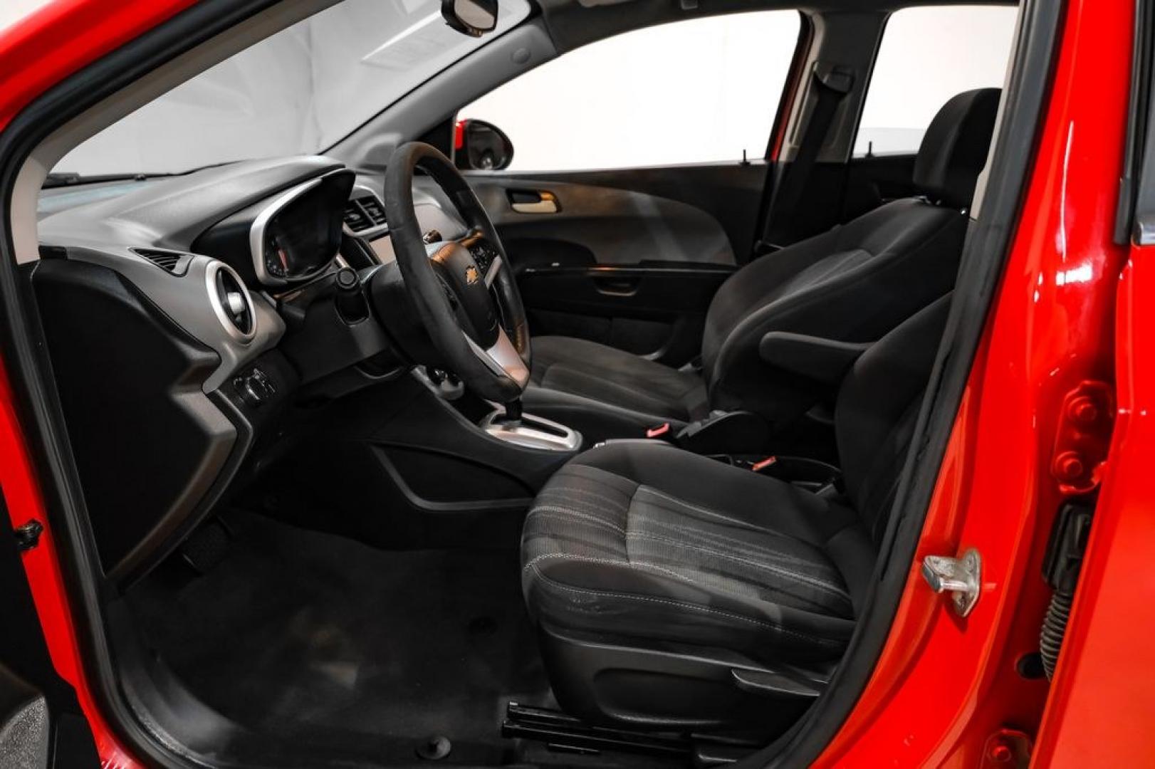 2018 Red /Jet Black/Dark Titanium Chevrolet Sonic LT (1G1JD5SH5J4) with an ECOTEC 1.8L I4 DOHC VVT engine, Automatic transmission, located at 15300 Midway Rd., Addison, TX, 75001, (972) 702-0011, 32.958321, -96.838074- Photo#3
