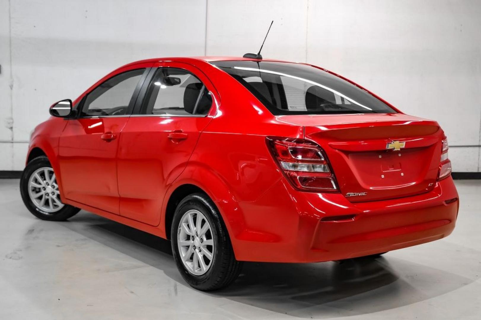 2018 Red /Jet Black/Dark Titanium Chevrolet Sonic LT (1G1JD5SH5J4) with an ECOTEC 1.8L I4 DOHC VVT engine, Automatic transmission, located at 15300 Midway Rd., Addison, TX, 75001, (972) 702-0011, 32.958321, -96.838074- Photo#9