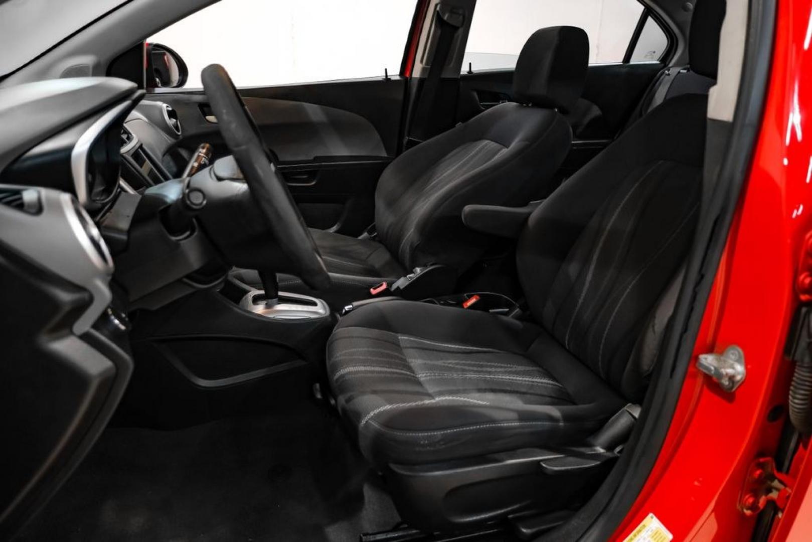 2018 Red /Jet Black/Dark Titanium Chevrolet Sonic LT (1G1JD5SH5J4) with an ECOTEC 1.8L I4 DOHC VVT engine, Automatic transmission, located at 15300 Midway Rd., Addison, TX, 75001, (972) 702-0011, 32.958321, -96.838074- Photo#29
