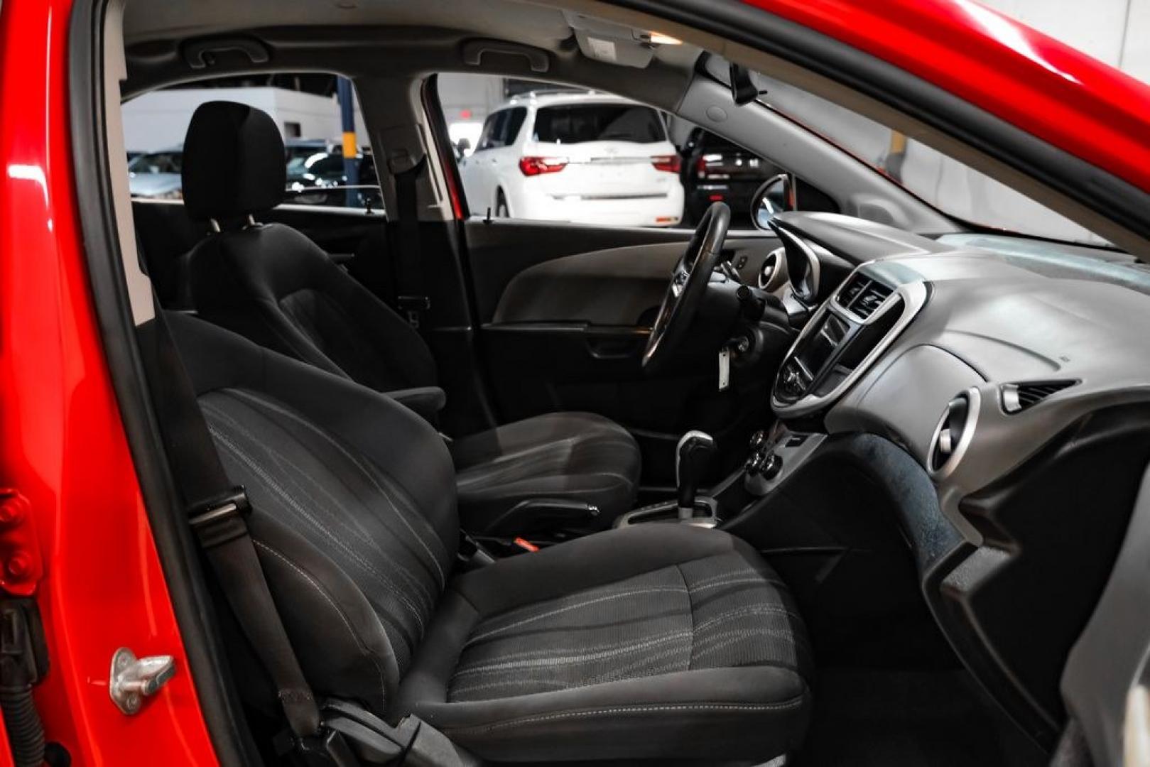 2018 Red /Jet Black/Dark Titanium Chevrolet Sonic LT (1G1JD5SH5J4) with an ECOTEC 1.8L I4 DOHC VVT engine, Automatic transmission, located at 15300 Midway Rd., Addison, TX, 75001, (972) 702-0011, 32.958321, -96.838074- Photo#30
