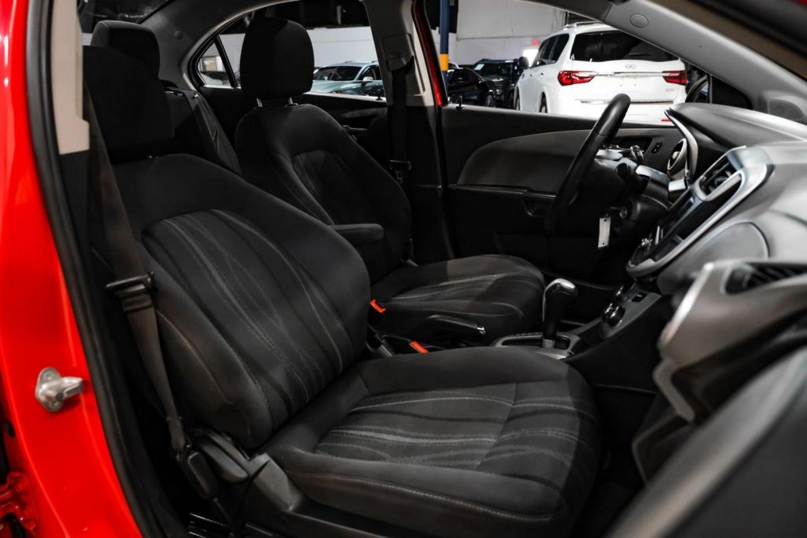 2018 Red /Jet Black/Dark Titanium Chevrolet Sonic LT (1G1JD5SH5J4) with an ECOTEC 1.8L I4 DOHC VVT engine, Automatic transmission, located at 15300 Midway Rd., Addison, TX, 75001, (972) 702-0011, 32.958321, -96.838074- Photo#31